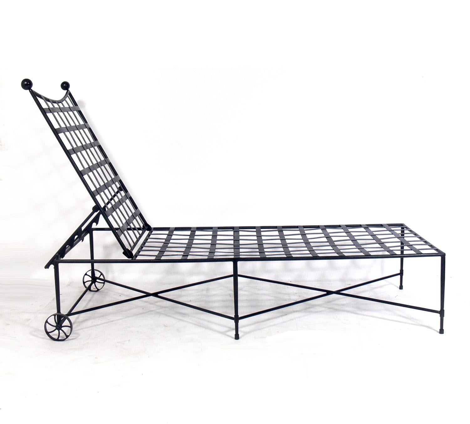Sculptural iron chaise lounge chairs, designed by Mario Papperzini for Salterini, Italian, circa 1960s. They are a versatile form and can be used indoors or outdoors. This design was used by Yves Saint Laurent in his personal residence at la Rue de