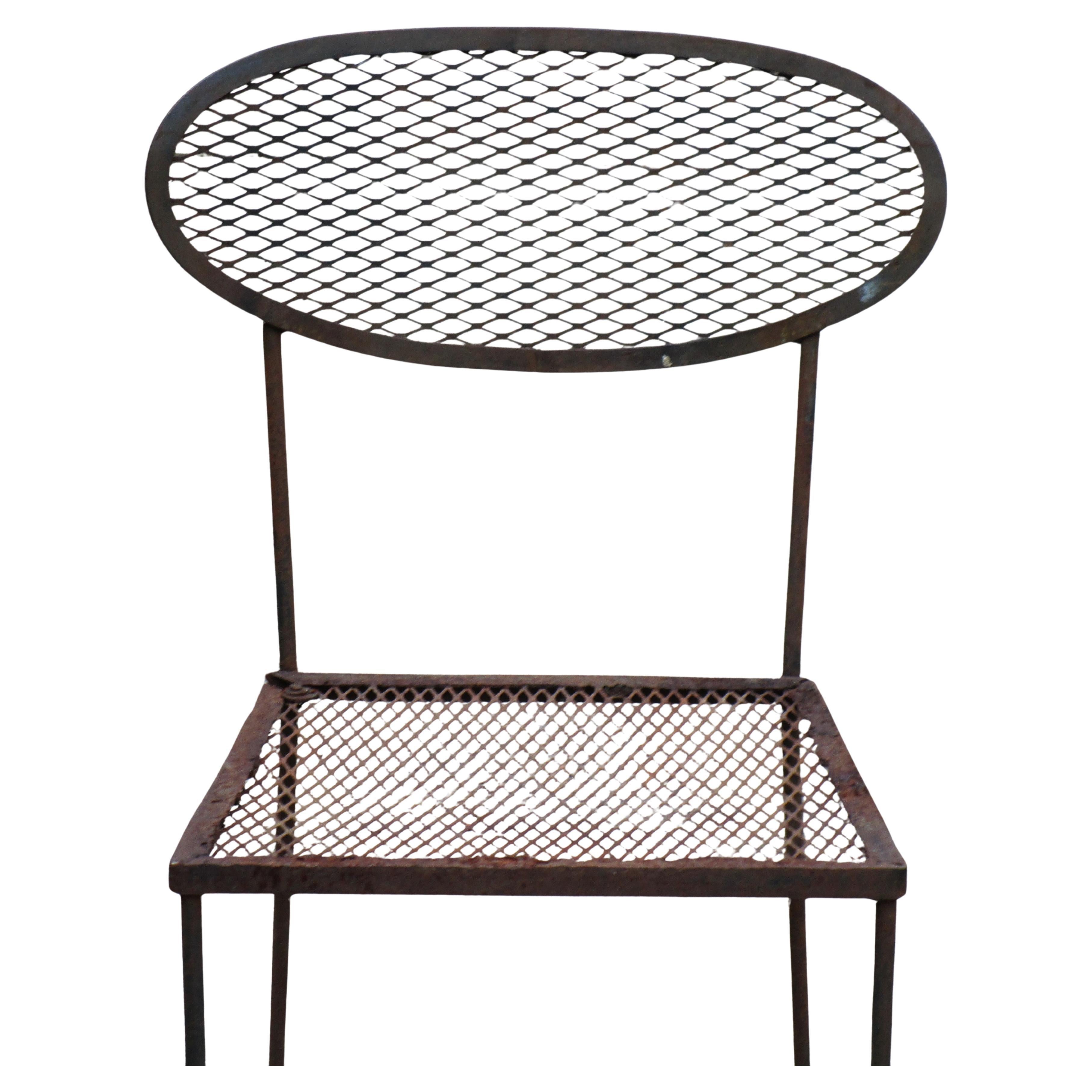 Very fine and delcate iron mesh chair. For Interior or garden. A great looking piece of furniture as sculpture art object. Circa 1950. Look at all pictures and read condition report in comment section.