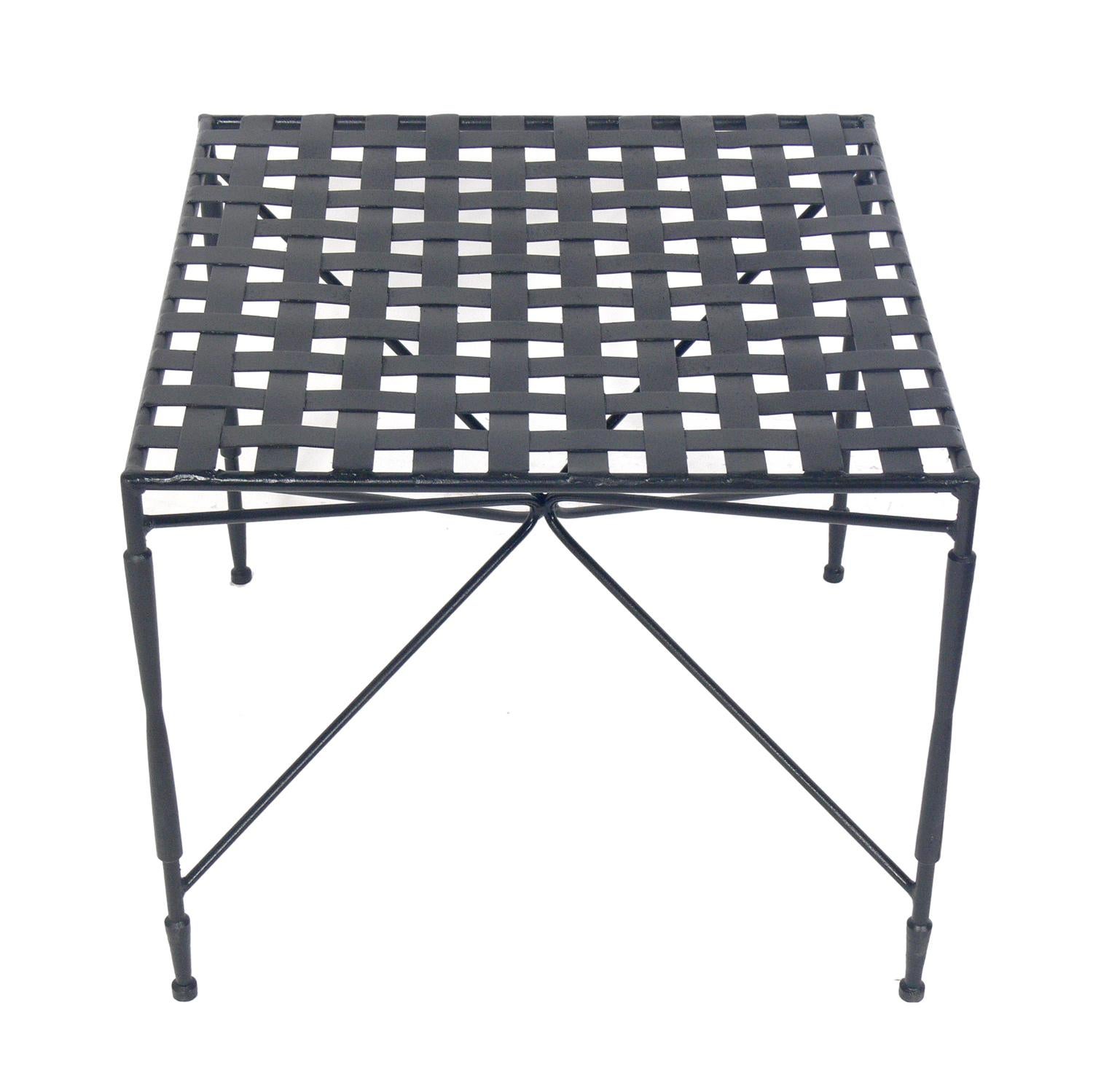 Sculptural iron coffee table, designed by Mario Papperzini for Salterini, Italian, circa 1960s. This is a versatile form and it can be used indoors or outdoors. This design was used by Yves Saint Laurent in his personal residence at la Rue de