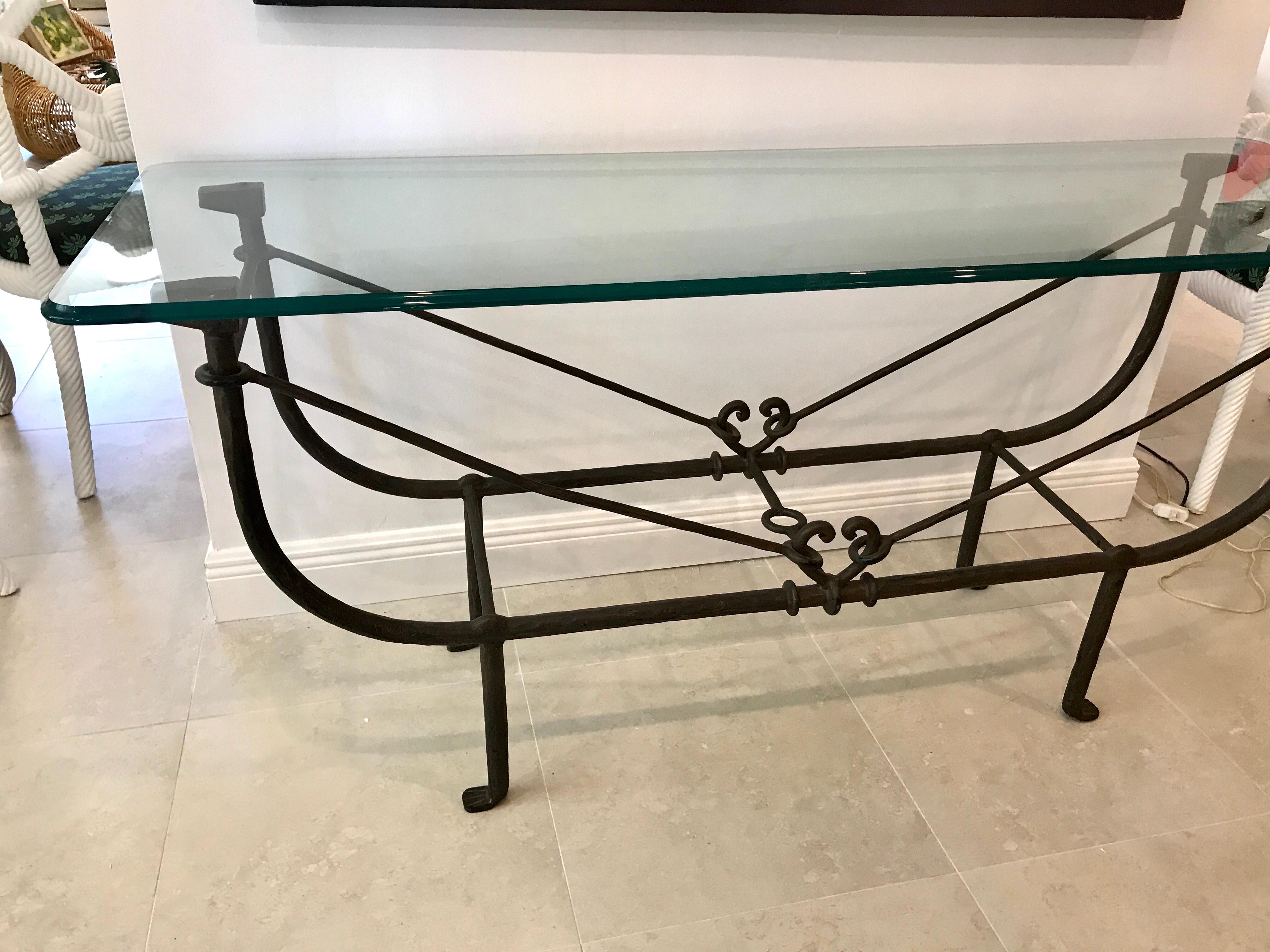 Sculptural iron table base in the style of Giacometti, can be used as a console or dining table base, shown with a glass top 67