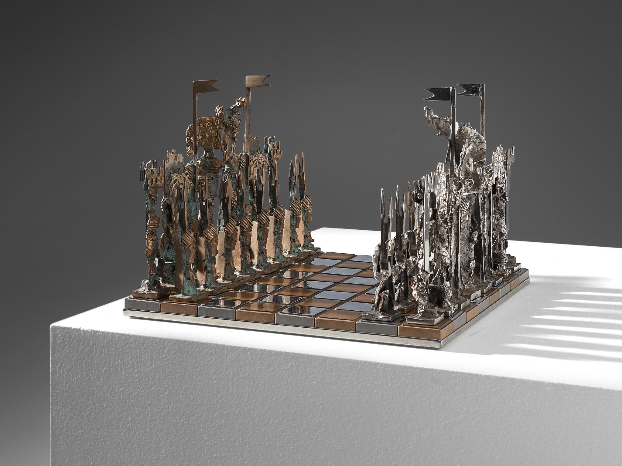 Chess game, bronze, metal, glass, Italy, 1970s.

Exceptional game of chess. The board consists of bronze and mirrored cubes. All chess pieces are handmade and can be recognized as a specific character of the game by their highly detailed quality.