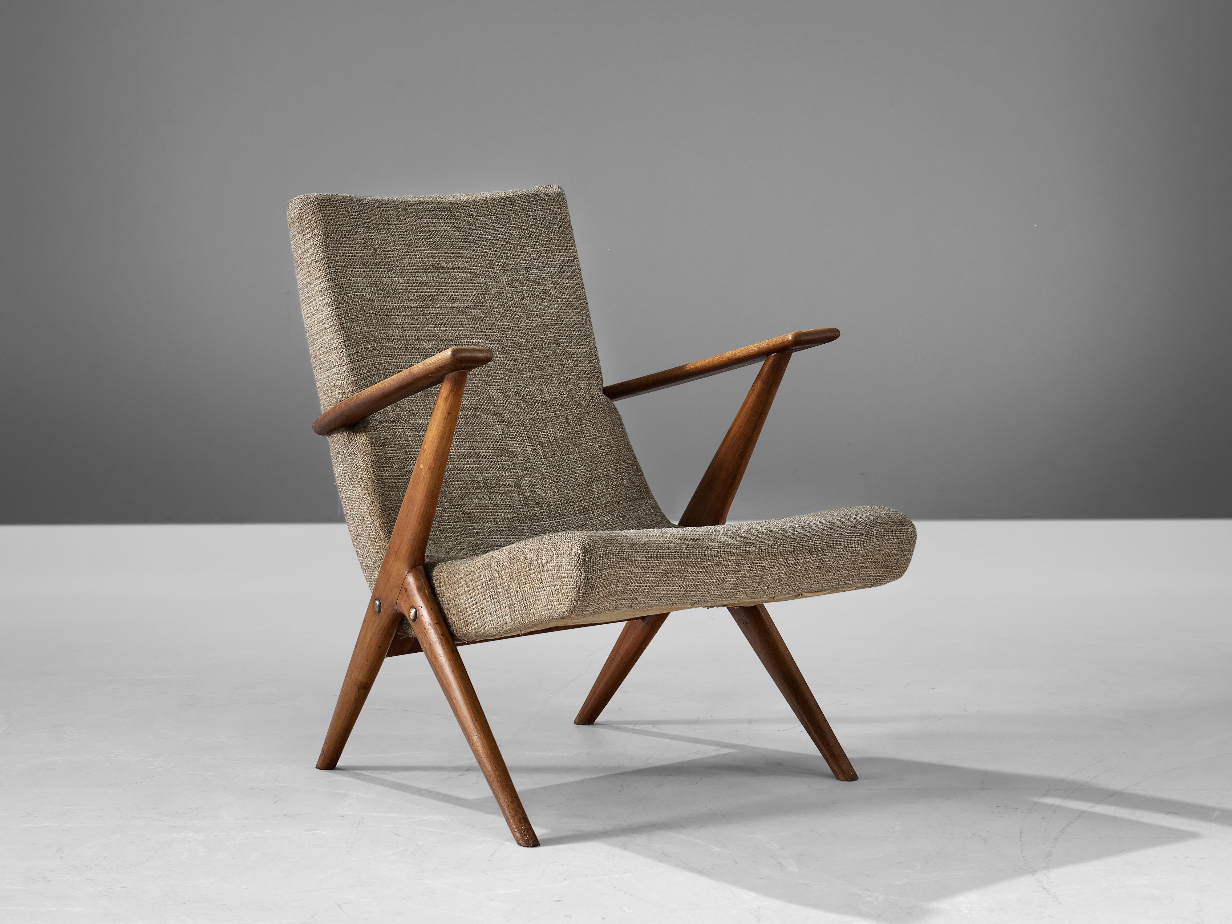 Armchair, cherry, beige fabric, Italy, 1950s

This chair is designed in Italy in the 1950s. The chair has a few distinct features that stand out. For instance the sculptural, upwards rising armrests. Additionally, the sculptural tapered legs and