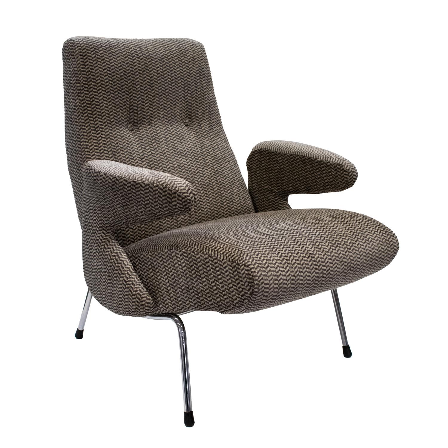 Sculptural lounge chair with chrome base and upholstered seat, back and arms, Italian 1960's.  This chair has been newly reupholstered by Lobel Modern in a beautiful fabric.  It is extremely comfortable.