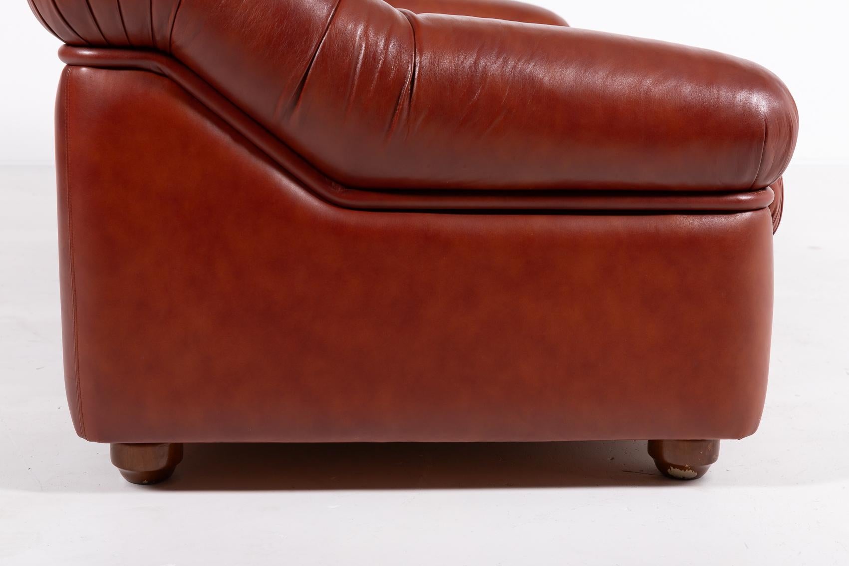 Leather Sculptural Italian Modern three seat cognac leather sofa, 1970’s For Sale