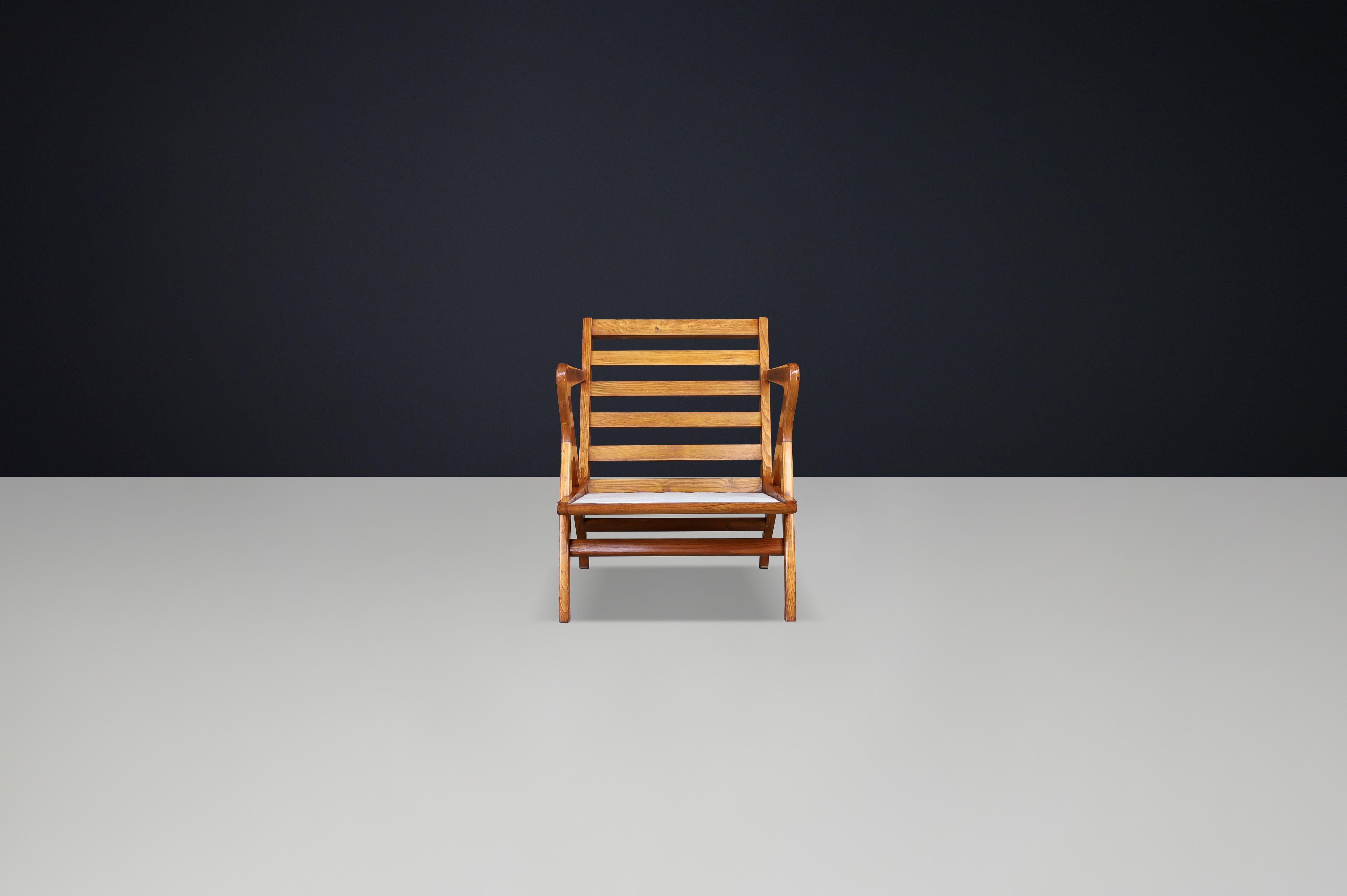 Skulpturaler Sessel aus italienischem Nussbaumholz, 1950er Jahre - Ikone des modernen Designs der Jahrhundertmitte im Zustand „Gut“ im Angebot in Almelo, NL