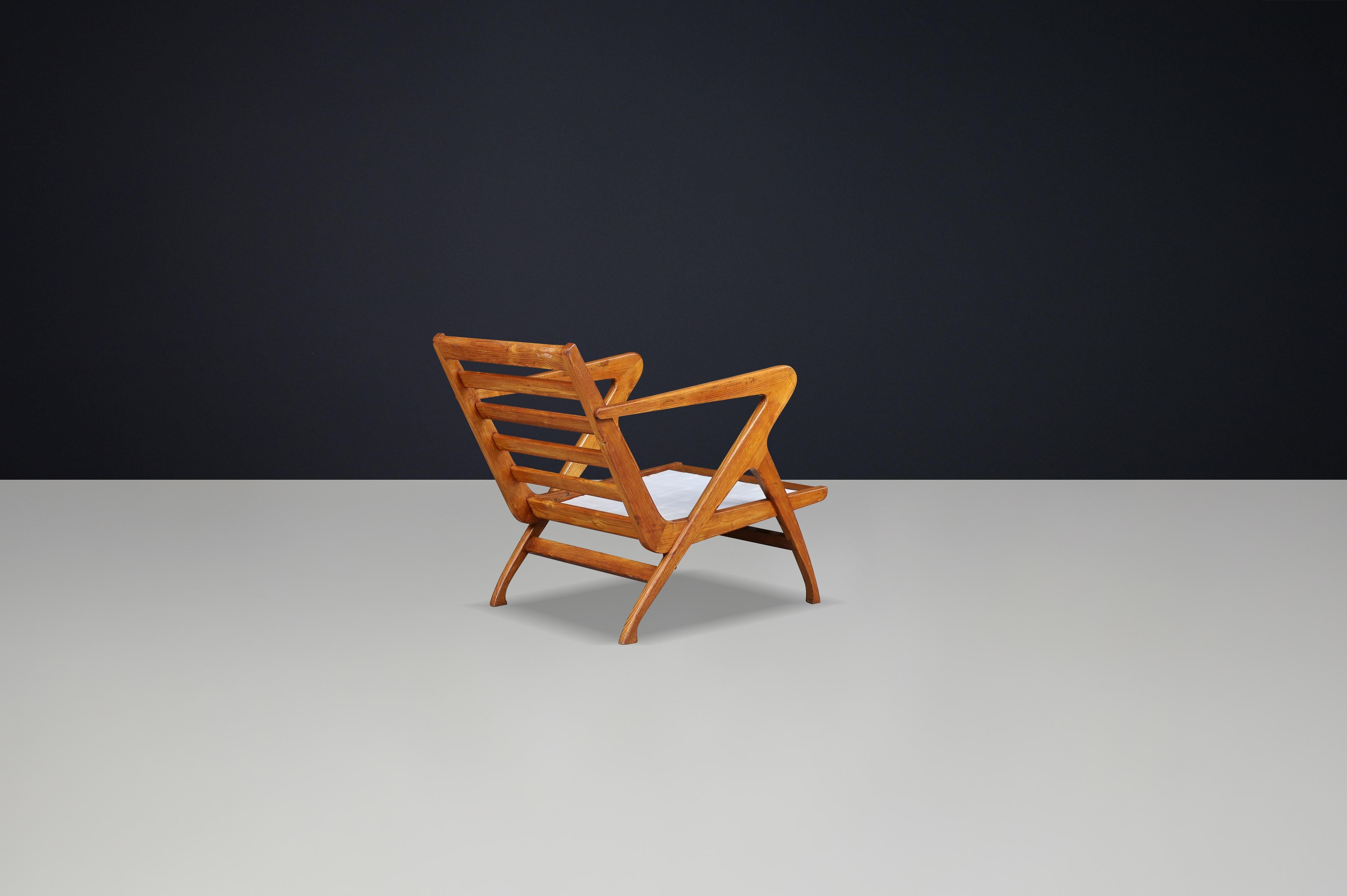 Skulpturaler Sessel aus italienischem Nussbaumholz, 1950er Jahre - Ikone des modernen Designs der Jahrhundertmitte im Angebot 2