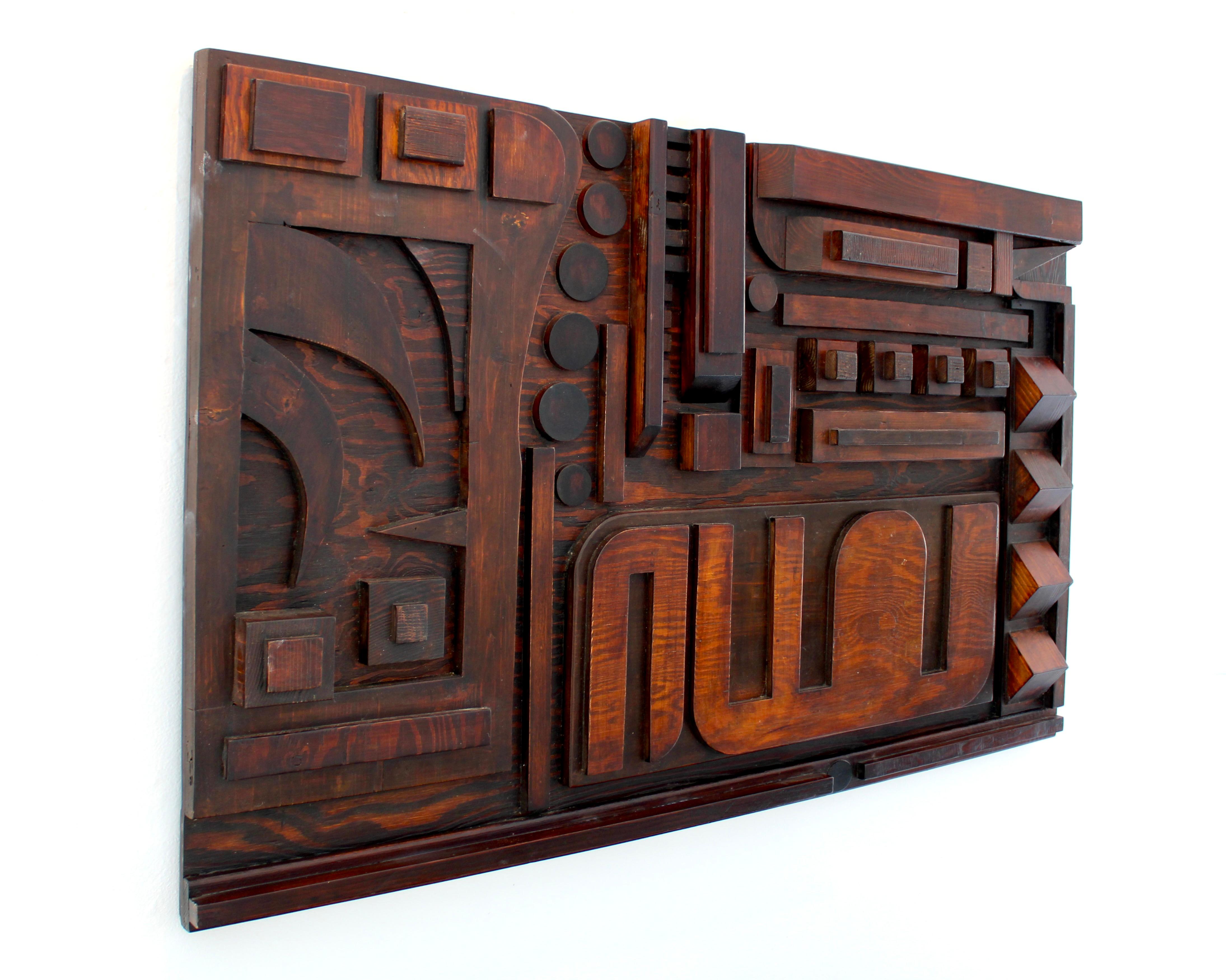 Sculptural wood mosaic stained wall panel in style and school of Nerone and Patuzzi Grupo 2. Abstract wood forms are mosaicked together on a bed of stained plywood and stained different tones. Signed NP Milano. An homage to Nerone Patuzzi. 