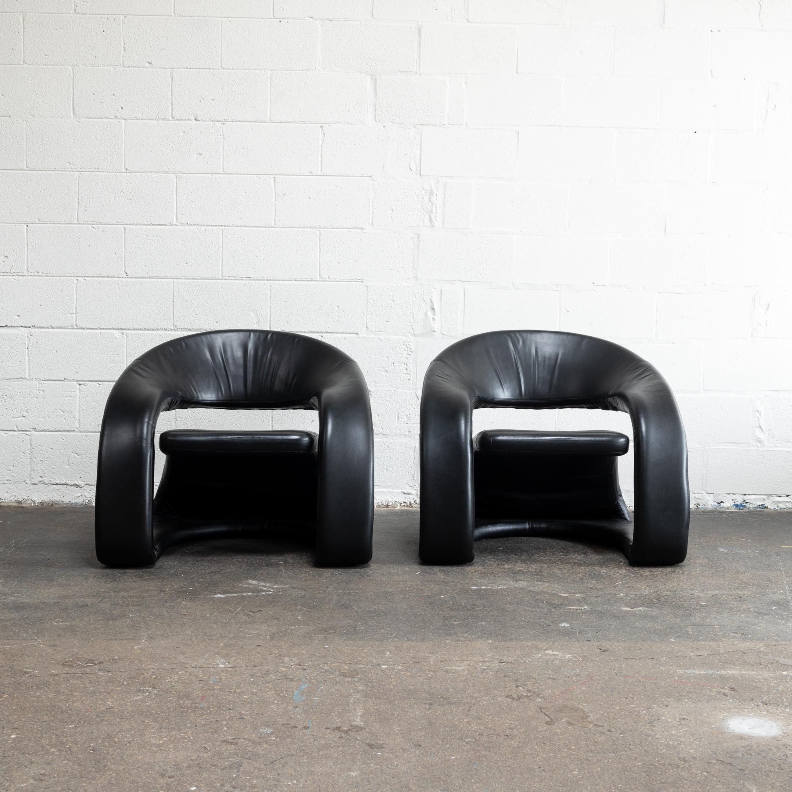 w/ black leather upholstery c. 1980s in great vintage condition ft. a cantilevered seat - they're incredibly comfortable.