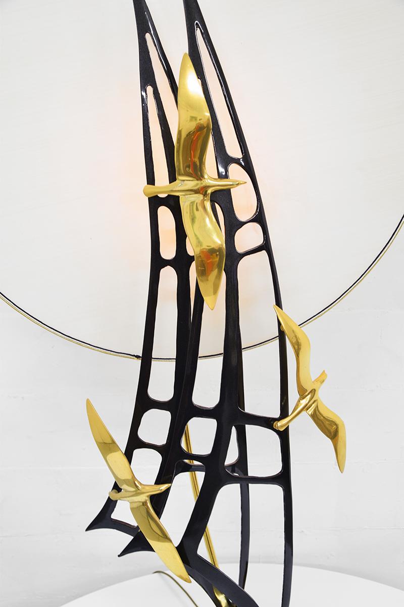 This very decorative large sculptural lamp was created by Lanciotto Galeotti for L'Originale in the 1970s. The lamp has a base in black lacquered wood, with Gold plated waves and seagulls, with the large black Sailboat sails make the composition