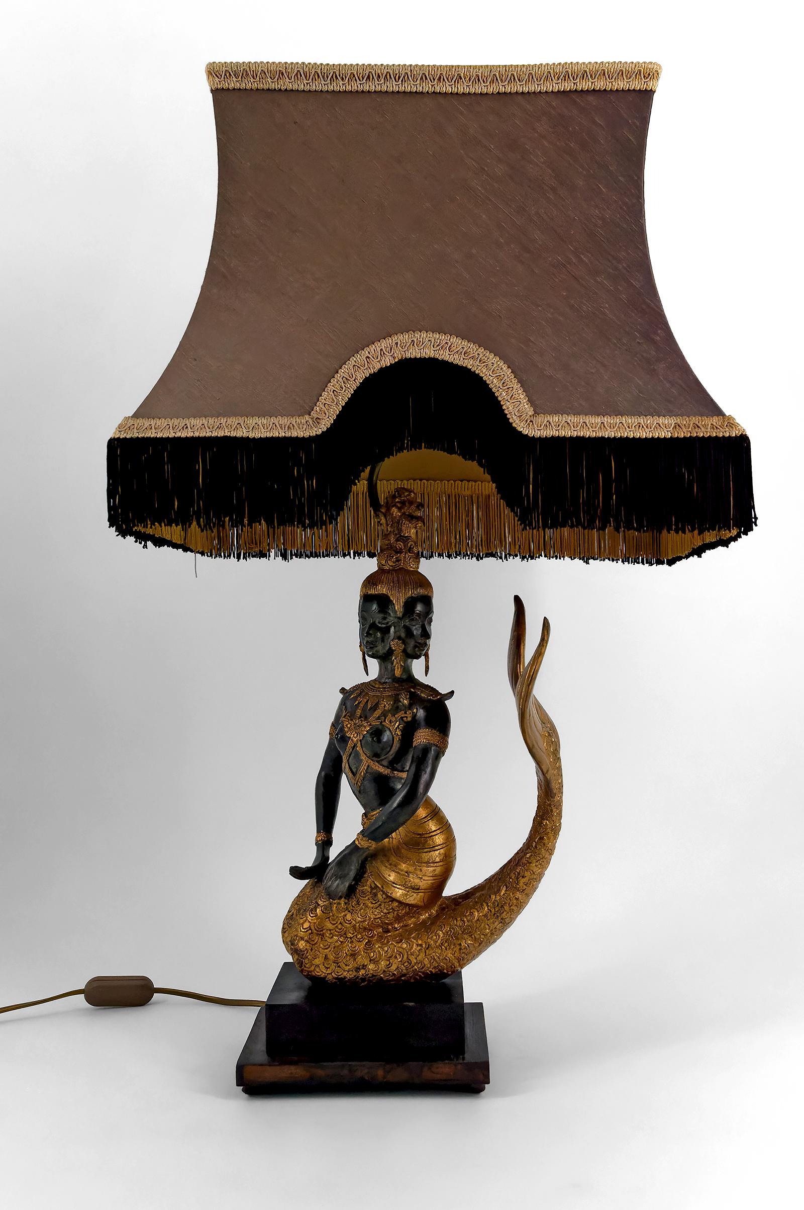 Sculptural Lamp in Bronze with Double Green and Gold Patina Representing the Mermaid Princess Suvannamaccha, Thailand, 20th Century


We present an exceptional piece that combines art, mythology, and Asian craftsmanship in a masterful sculptural