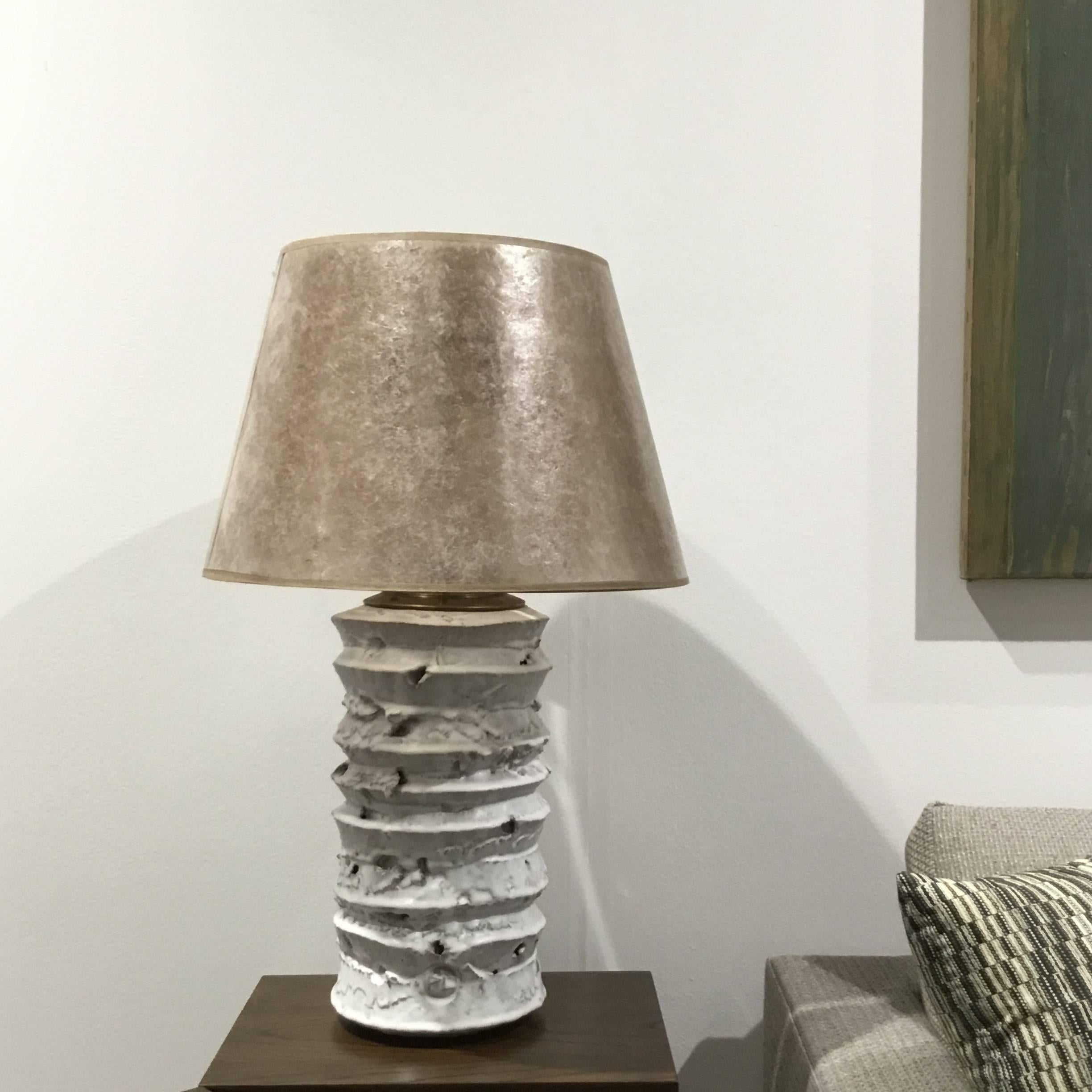 Peter Lane sculptures turned into lamps. White glazed rough texture.
Measure: Base height is 15
