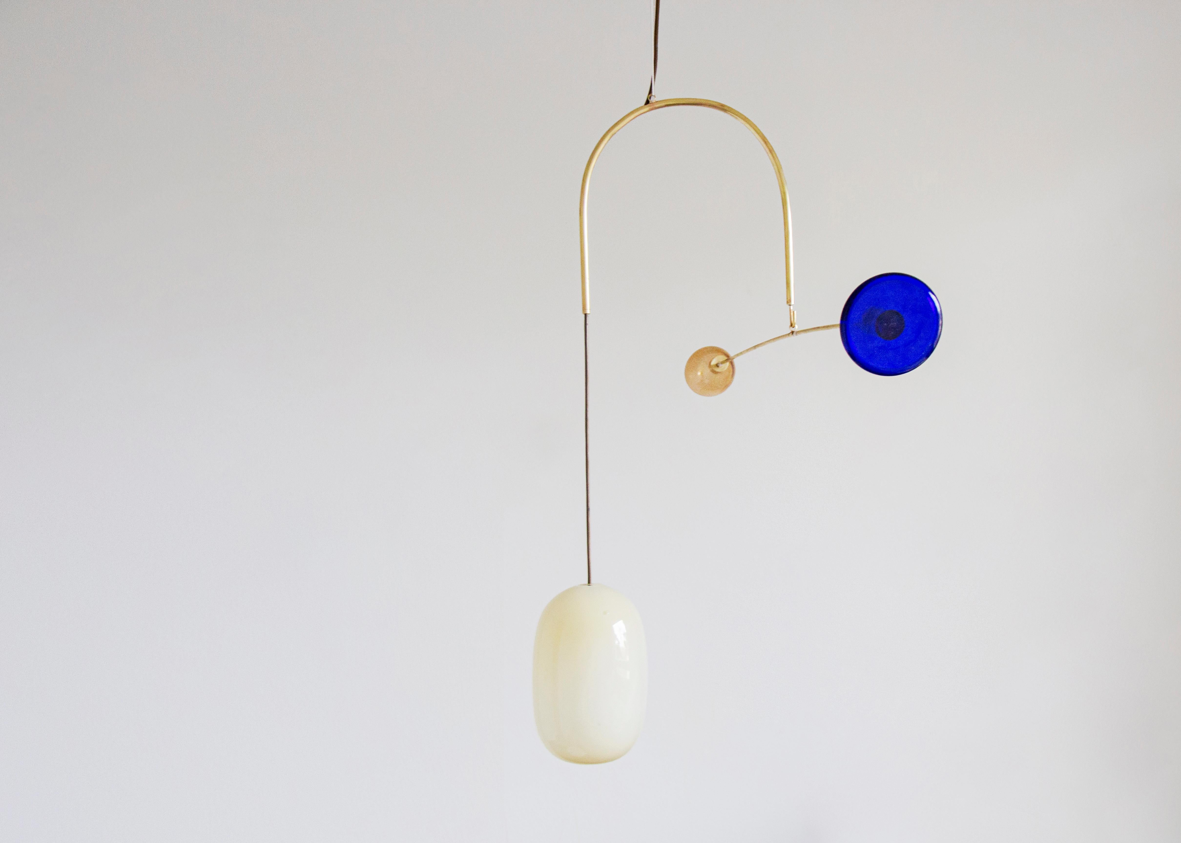 Sculptural Light No. 29 by Milla Vaahtera.
Dimensions: W 90 x H min 60 cm.
Materials: Glass, Brass.

In 2020 Milla Vaahtera started a series of unique sculptural lights made out of brass and hand blown glass.
