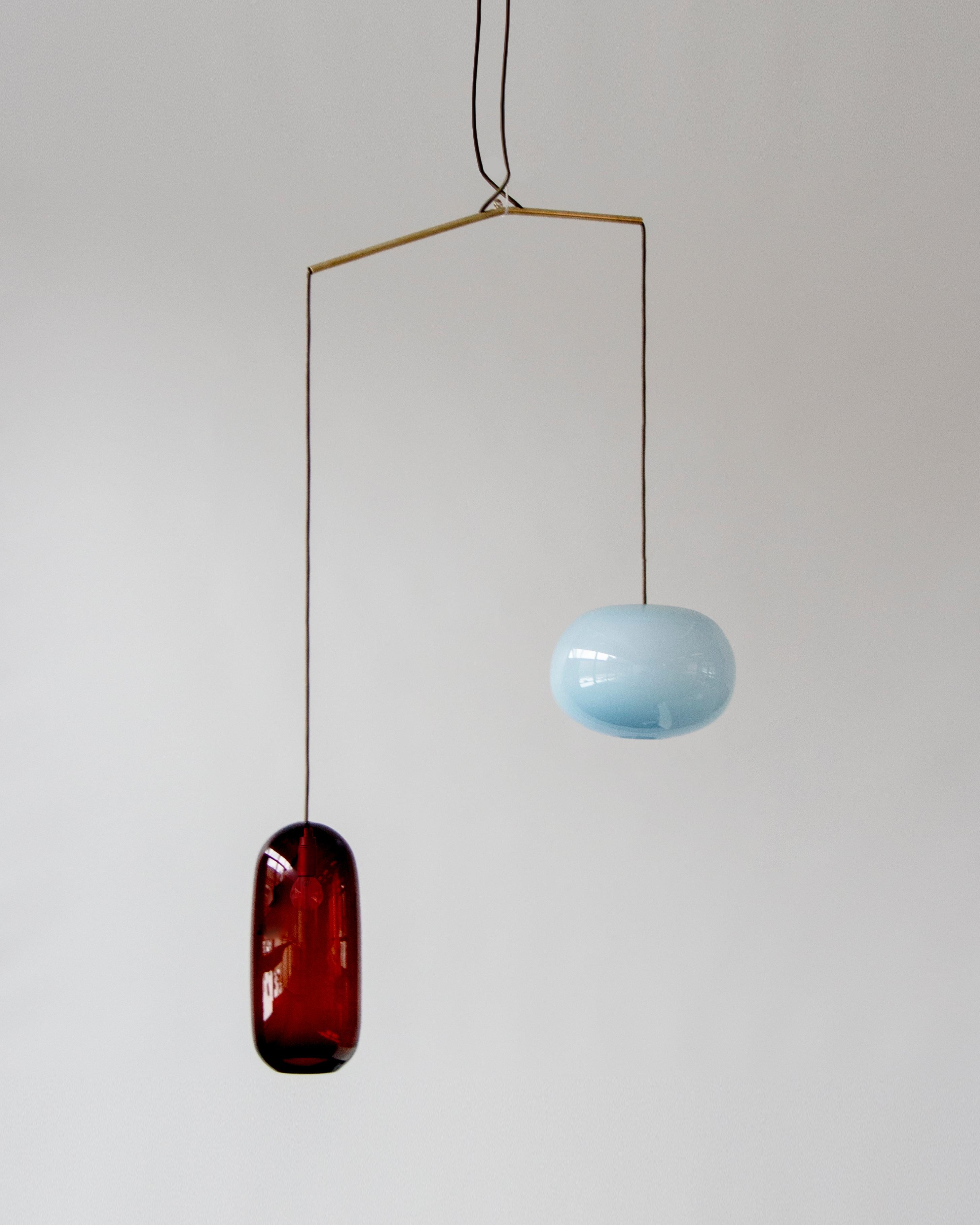 Sculptural light No. 64 by Milla Vaahtera
Dimensions: W 57 x D 26 x H 60 cm
Materials: glass, brass

In 2020 Milla Vaahtera started a series of unique sculptural lights made out of brass and hand blown glass.
