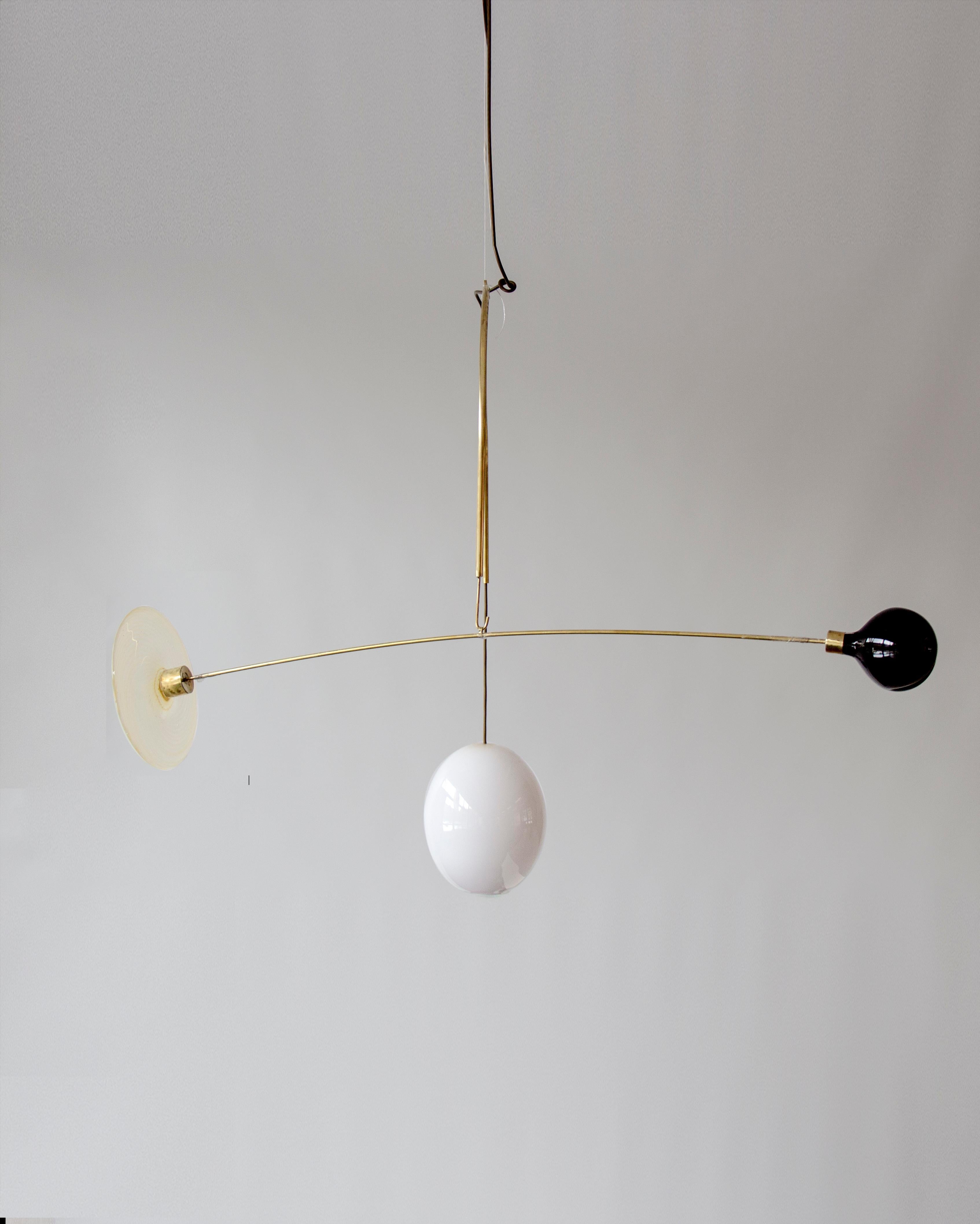 Sculptural light no. 65 by Milla Vaahtera
Dimensions: W 103 x D 55 x H 70 cm
Materials: Glass, brass

In 2020 Milla Vaahtera started a series of unique sculptural lights made out of brass and hand blown glass.
