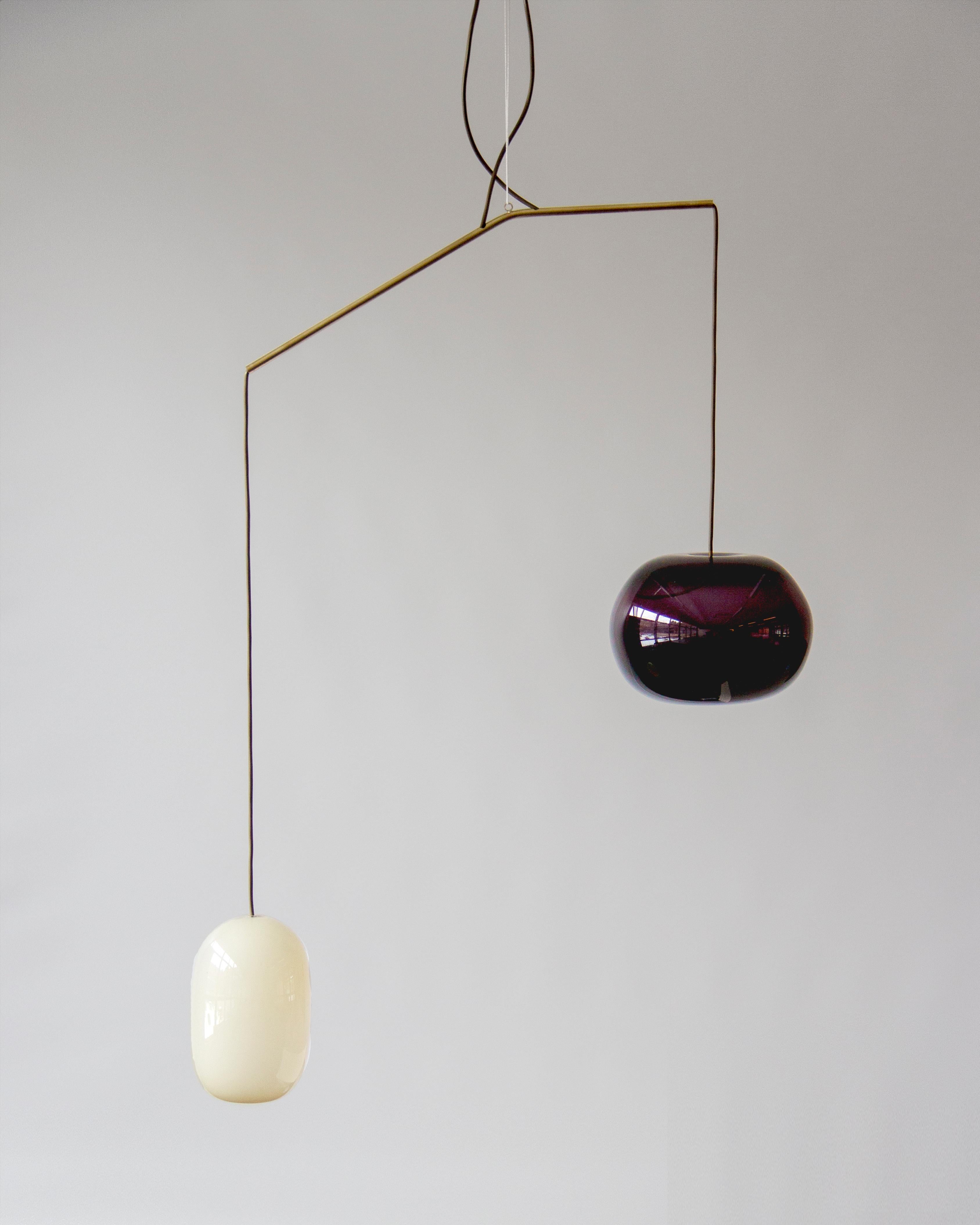Sculptural light No. 67 by Milla Vaahtera
Dimensions: W 70 x D 28 x H 60 cm
Materials: Glass, brass
Dark glass dome is deep dark violet.

In 2020 Milla Vaahtera started a series of unique sculptural lights made out of brass and hand blown