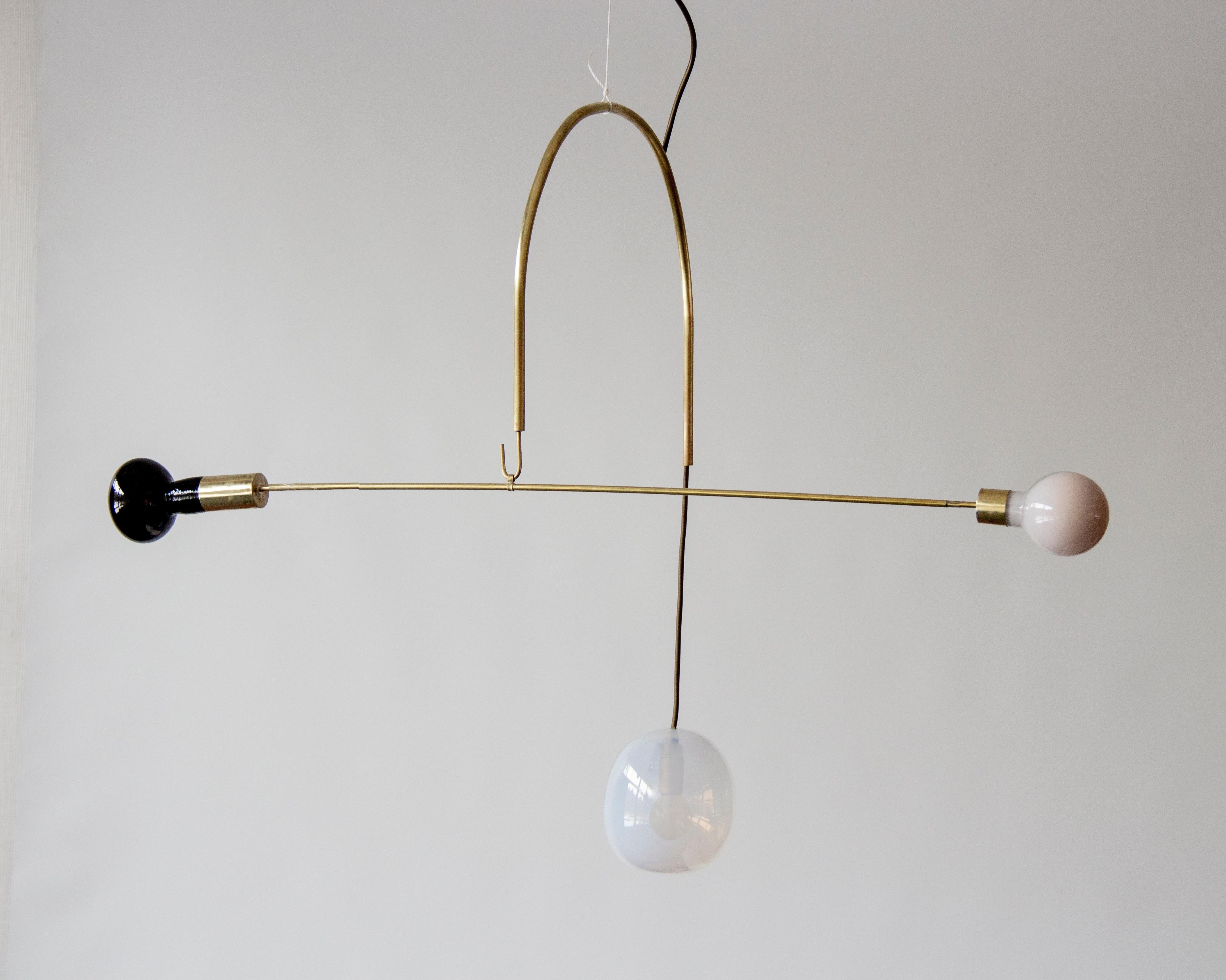 Sculptural light no. 67 by Milla Vaahtera.
Dimensions: W 85 x L 40 x H 60 cm.
Materials: glass, brass.

In 2020 Milla Vaahtera started a series of unique sculptural lights made out of brass and hand blown glass.
