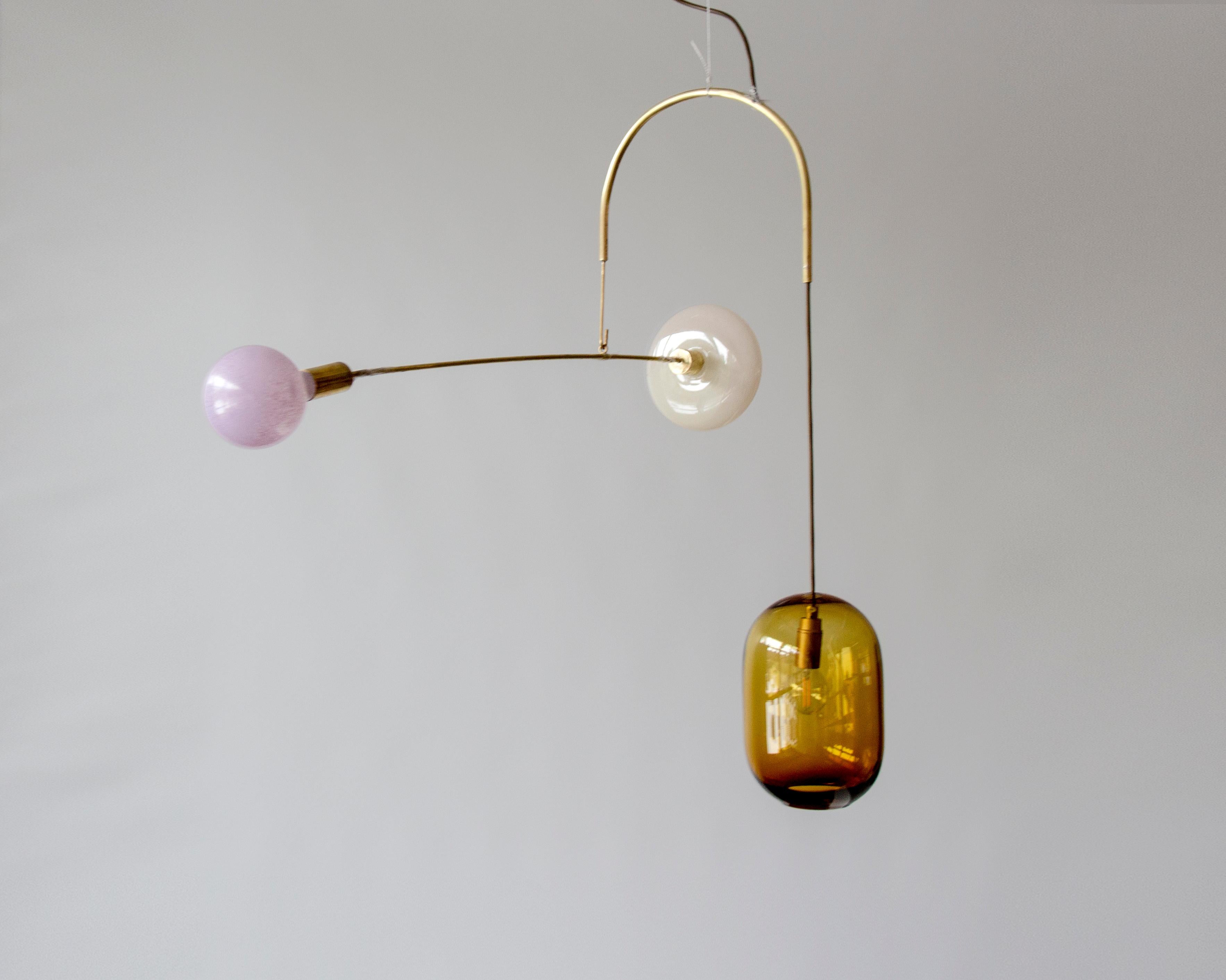 Sculptural light No. 68 by Milla Vaahtera
Dimensions: W 30 x L 85 x H 60 cm
Materials: Glass, Brass

In 2020 Milla Vaahtera started a series of unique sculptural lights made out of brass and hand blown glass.
