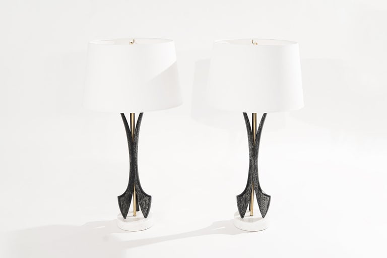 Set of sculpted table lamps in limed oak, featuring polished marble stand and brass accents. Completely rewired and ready for use, new white linen shades included.

Other designers working in the organic style include Vladmir Kagan, Paul Frankl,