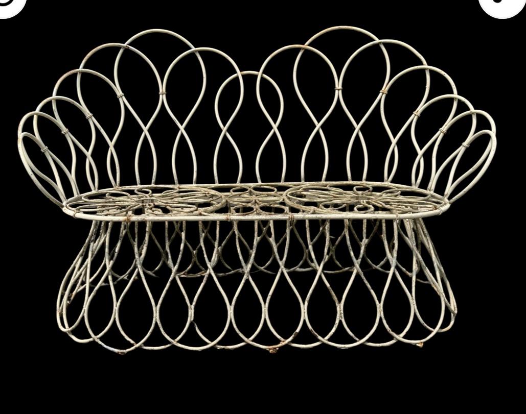 Sculptural loop settee and chairs in the manner of Frances Elkins, circa 1950s. Amazing design.. The 3 piece set retains its original finish.. distressed,. surface rust.. .(see photos) price reflected,, I can have set professionally restored if