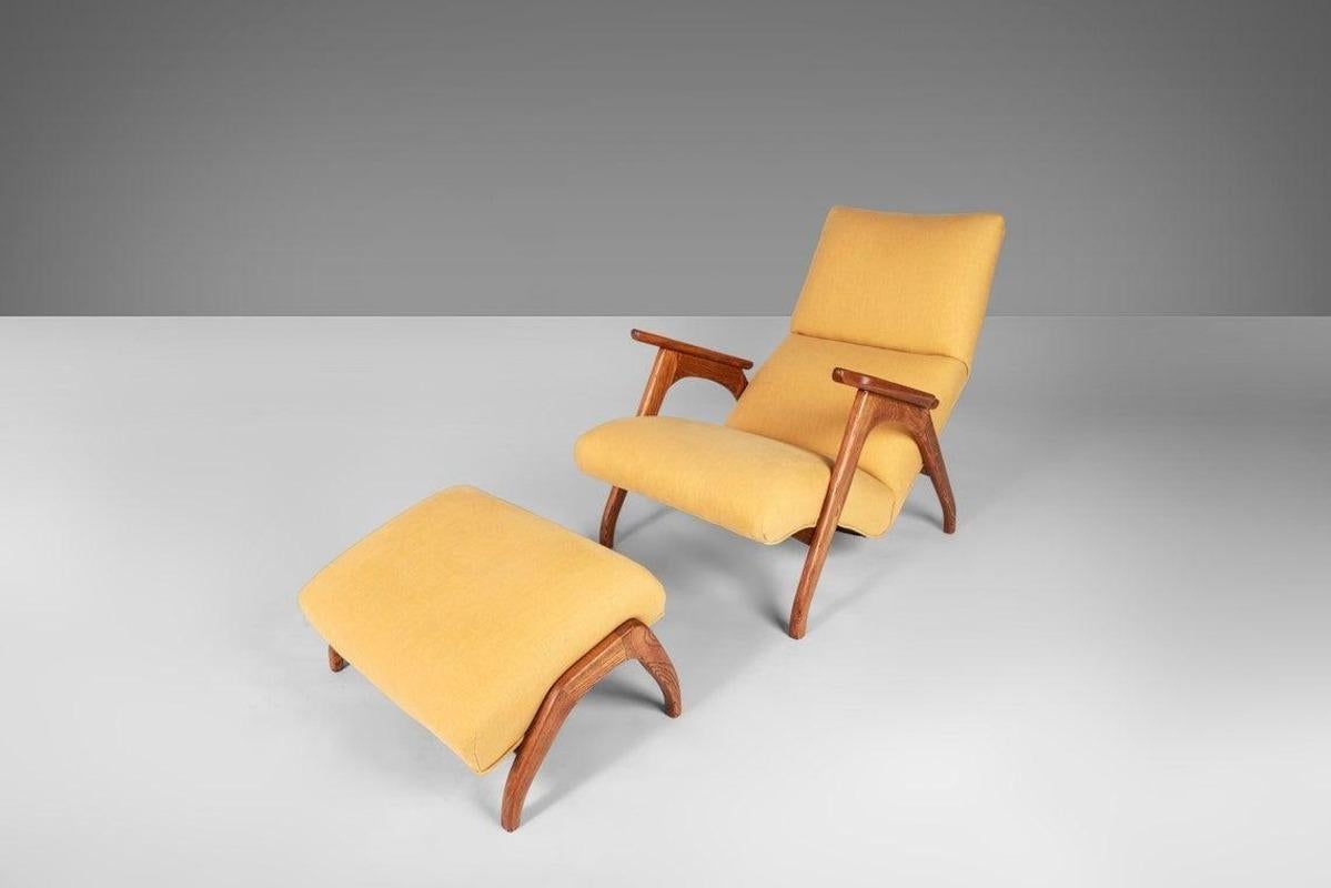 The perfect combination of contours and angles create this exceptional c. 1960 chair and ottoman after Adrian Pearsall. The arms and legs are sculpted from oak and finished with varnish accentuating the deep woodgrain. This pairing was recently