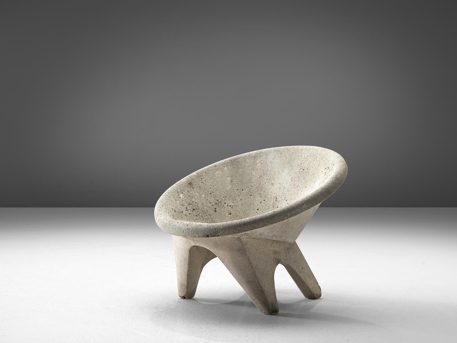 Outdoor chair, concrete, Europe, 1970s.

This characteristic lounge chair is completely made of concrete. This makes it ideal for outdoor use, for in a garden of patio. The chairs feature a tilted round shell that functions as the seat. The bulky
