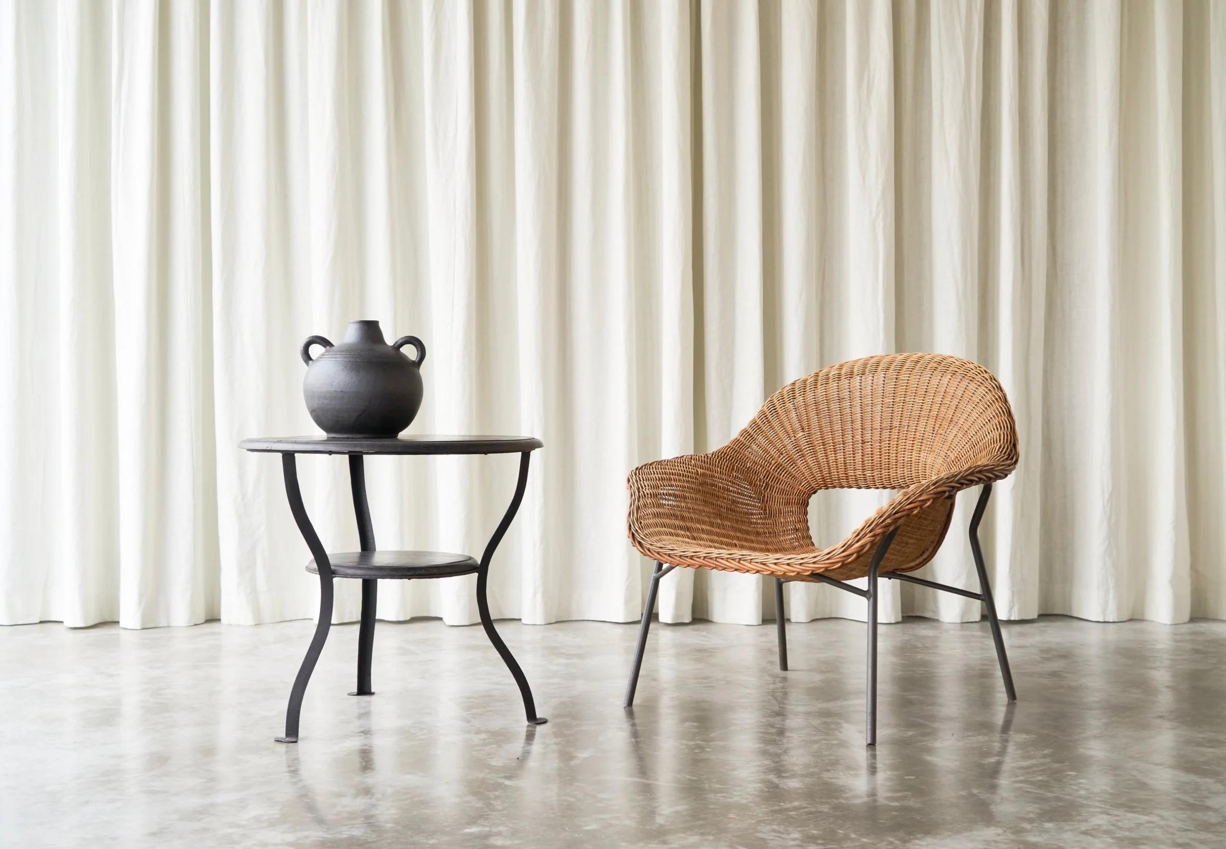 Sculptural Lounge Chair in Rattan and Metal, The Netherlands, 1960s.

This rattan and metal lounge chair was designed in the 1960s by Dirk Van Sliedregt, for Dutch manufacterer Gebroeders Jonkers. It is a rare model, as it was only made in a small