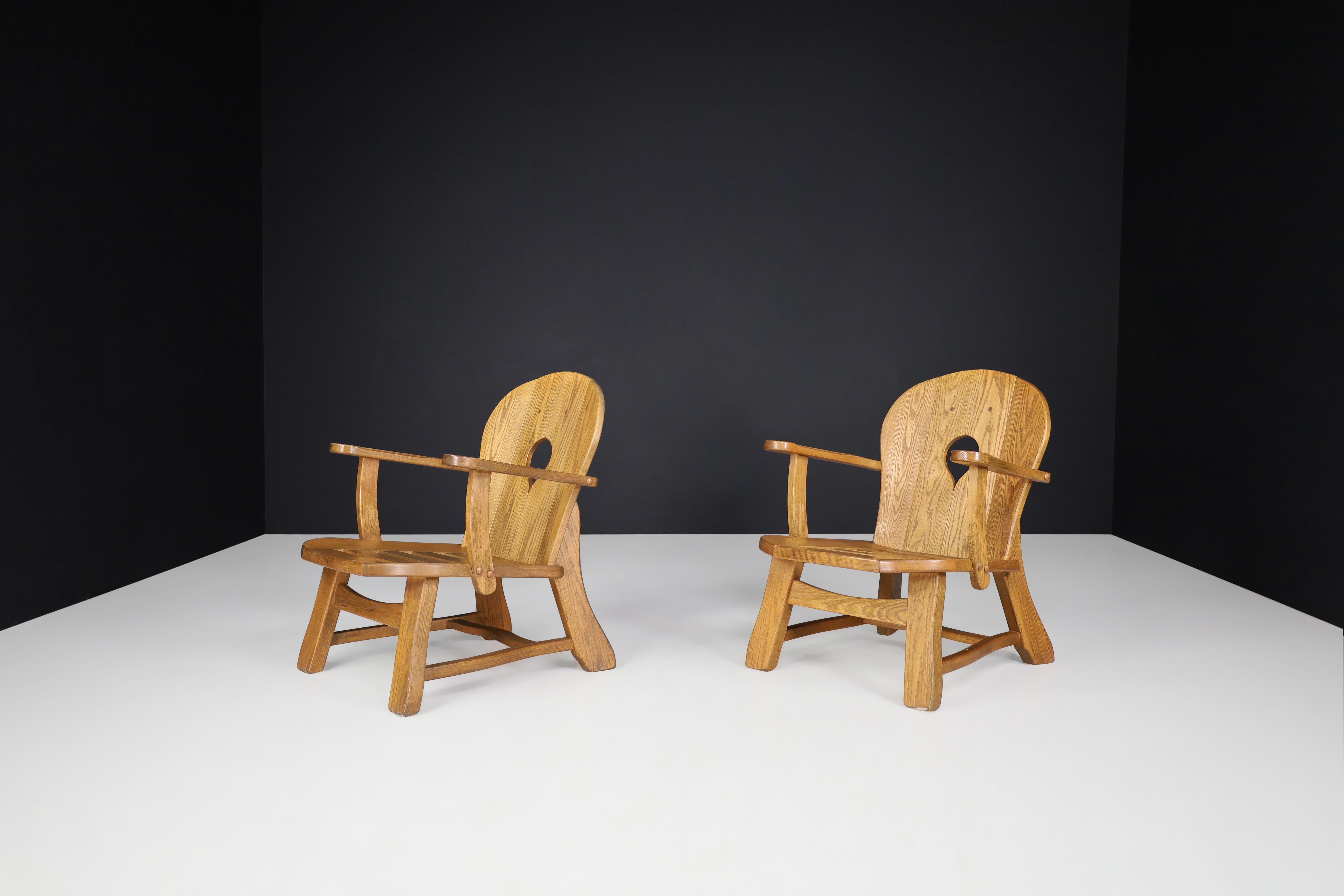 20th Century Sculptural Lounge Chairs in Oak, France, 1960s For Sale