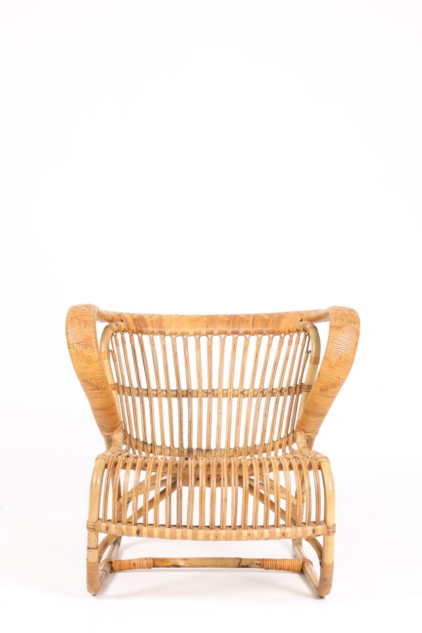 Great looking bamboo chair. Designed and made in Denmark. Great original condition.