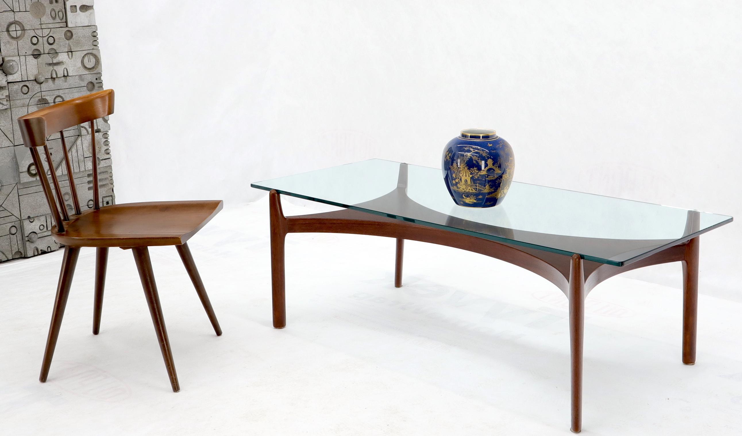 Danish Mid-Century Modern sculptural base low profile floating glass top coffee table. Adrian Pearsall decor.