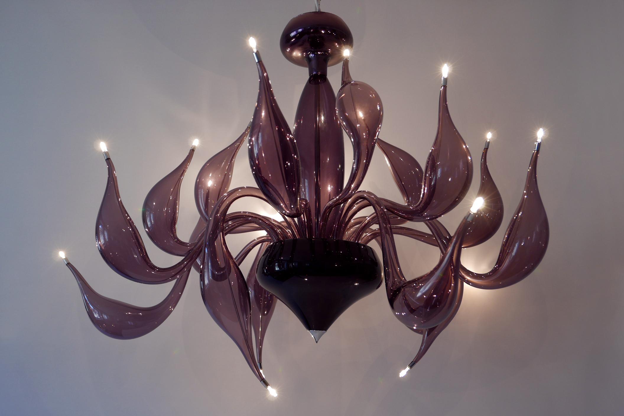 Original light object / sculpture Murano glass chandelier with 18 lights by Fabio Fornasier, 2004 for LU Murano, Italy. Makers mark: Fabio Fornasier. LU Murano. Including a replacement arm.

This one is bought by the previous owner in