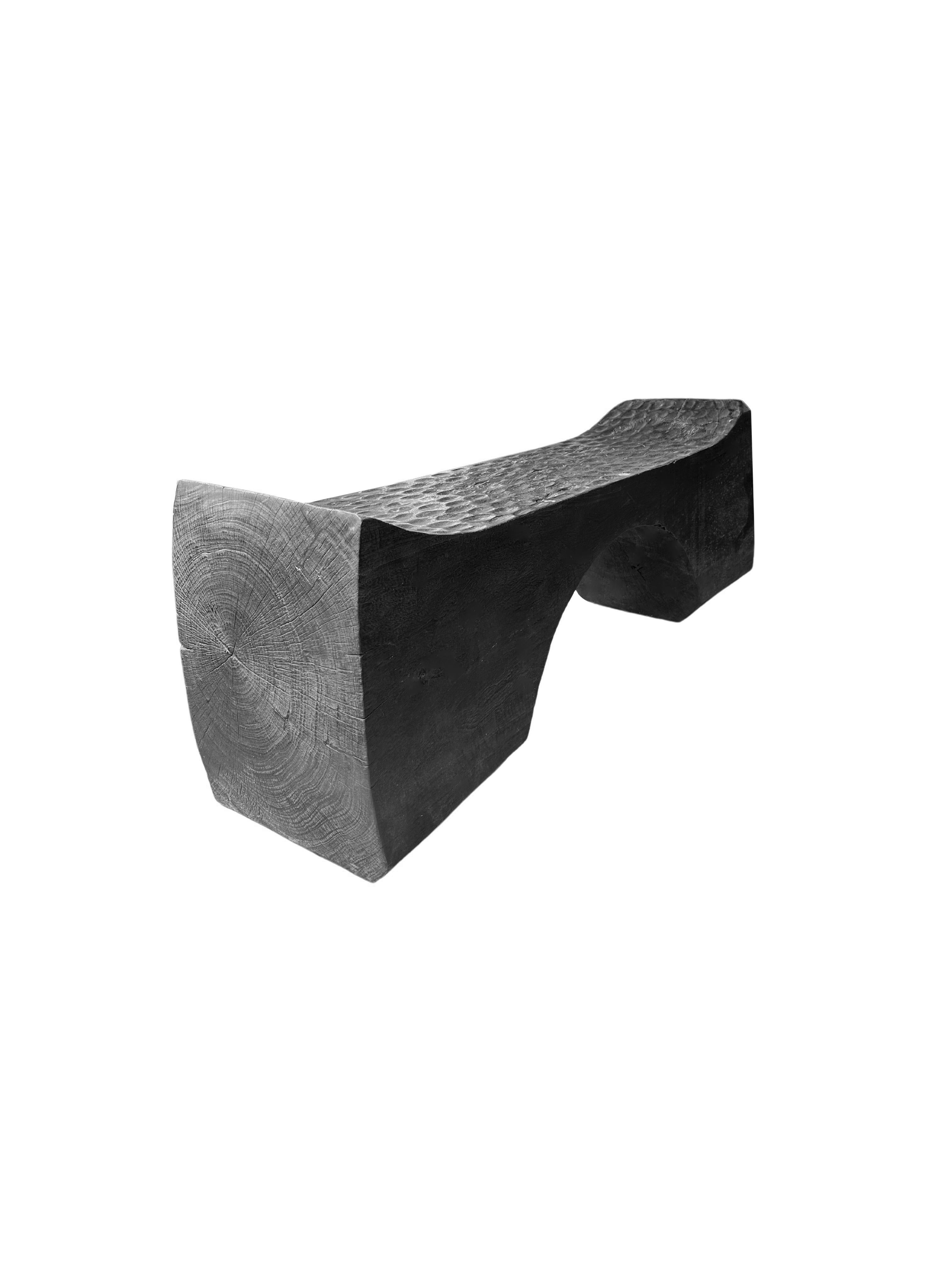 Indonesian Sculptural Mango Wood Bench with Burnt Finish Modern Organic, Hand-Hewn Detail For Sale