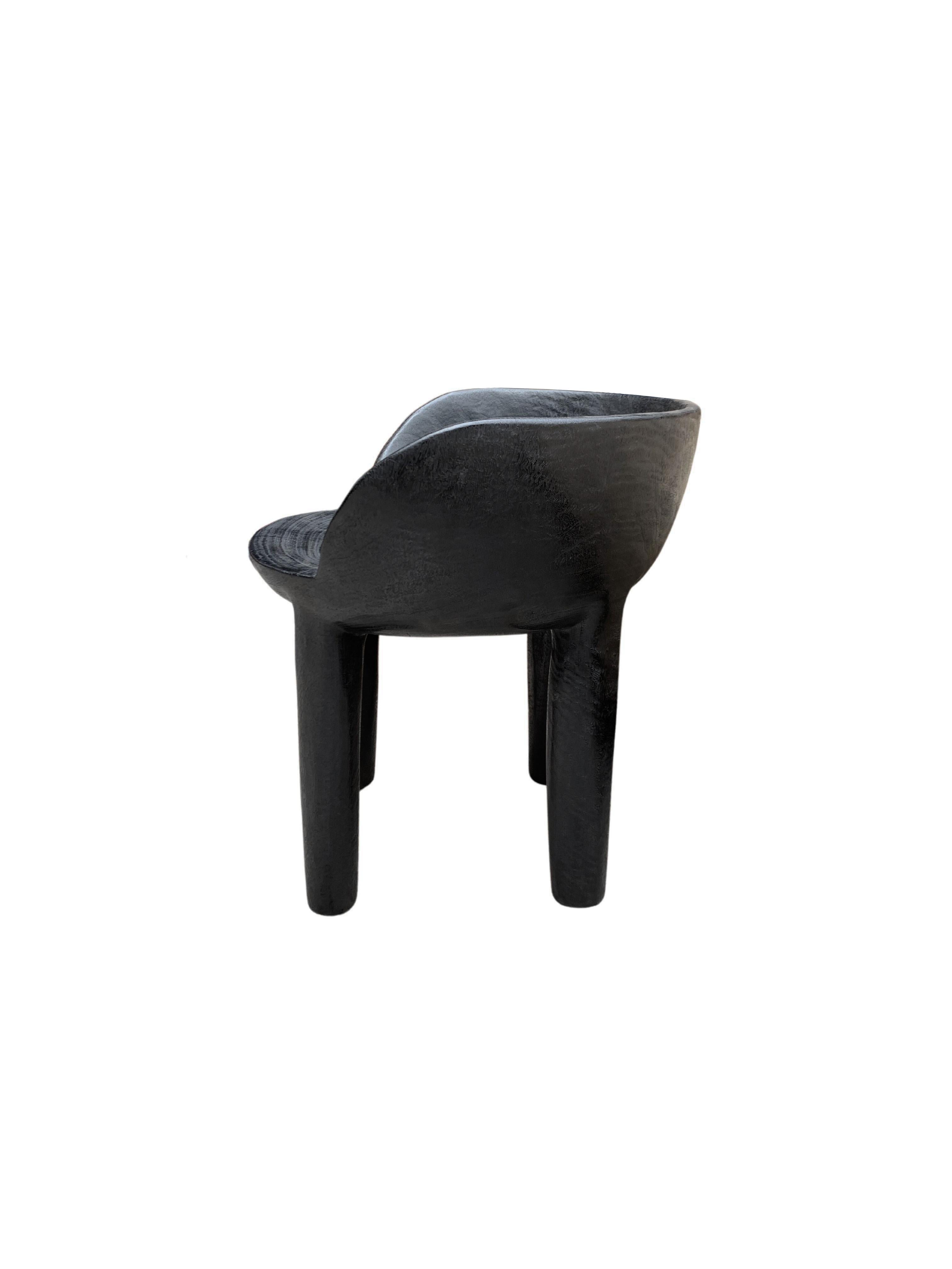 Indonesian Sculptural Mango Wood Chair Burnt Finish Modern Organic For Sale