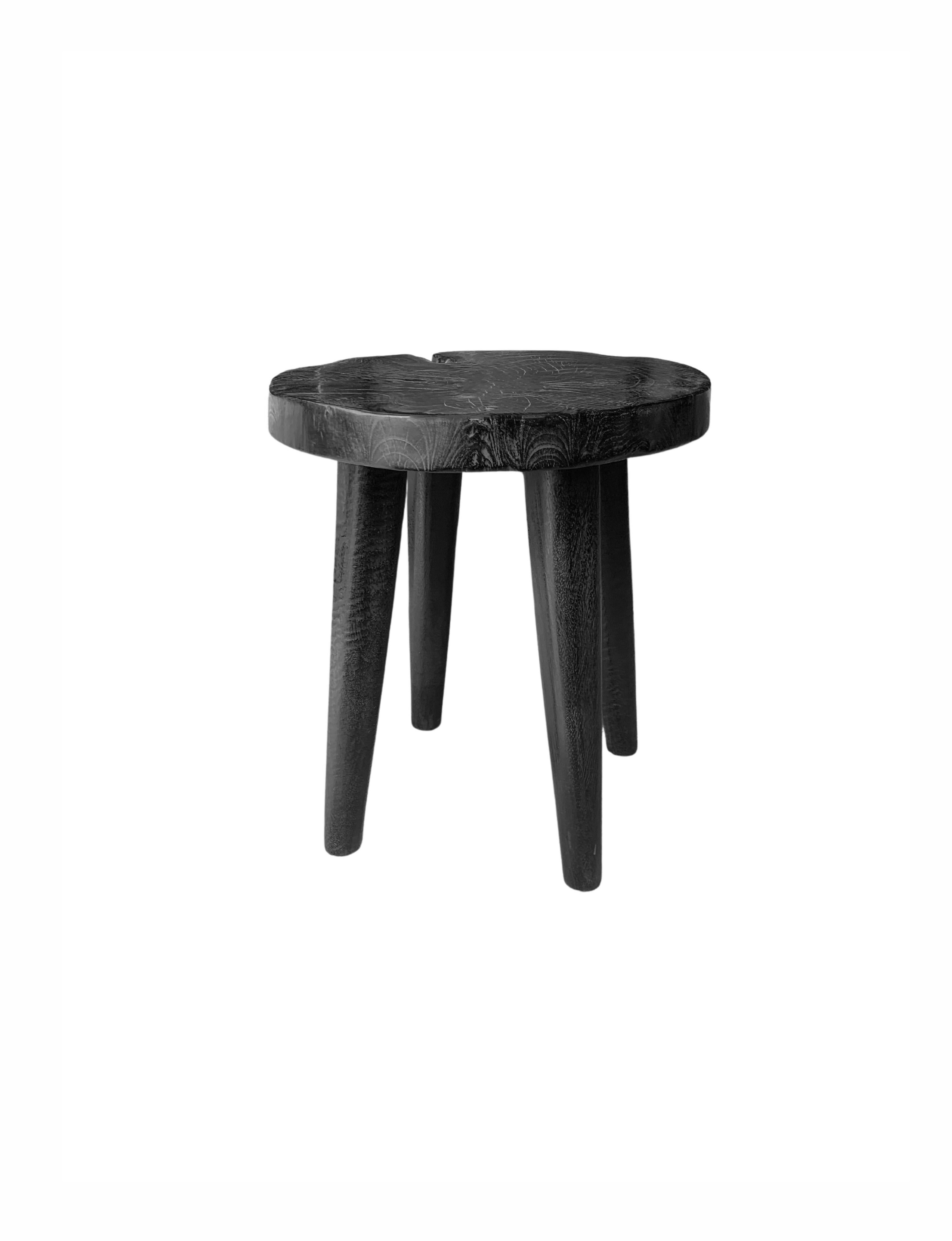 Hand-Crafted Sculptural Mango Wood Stool with Burnt Finish For Sale