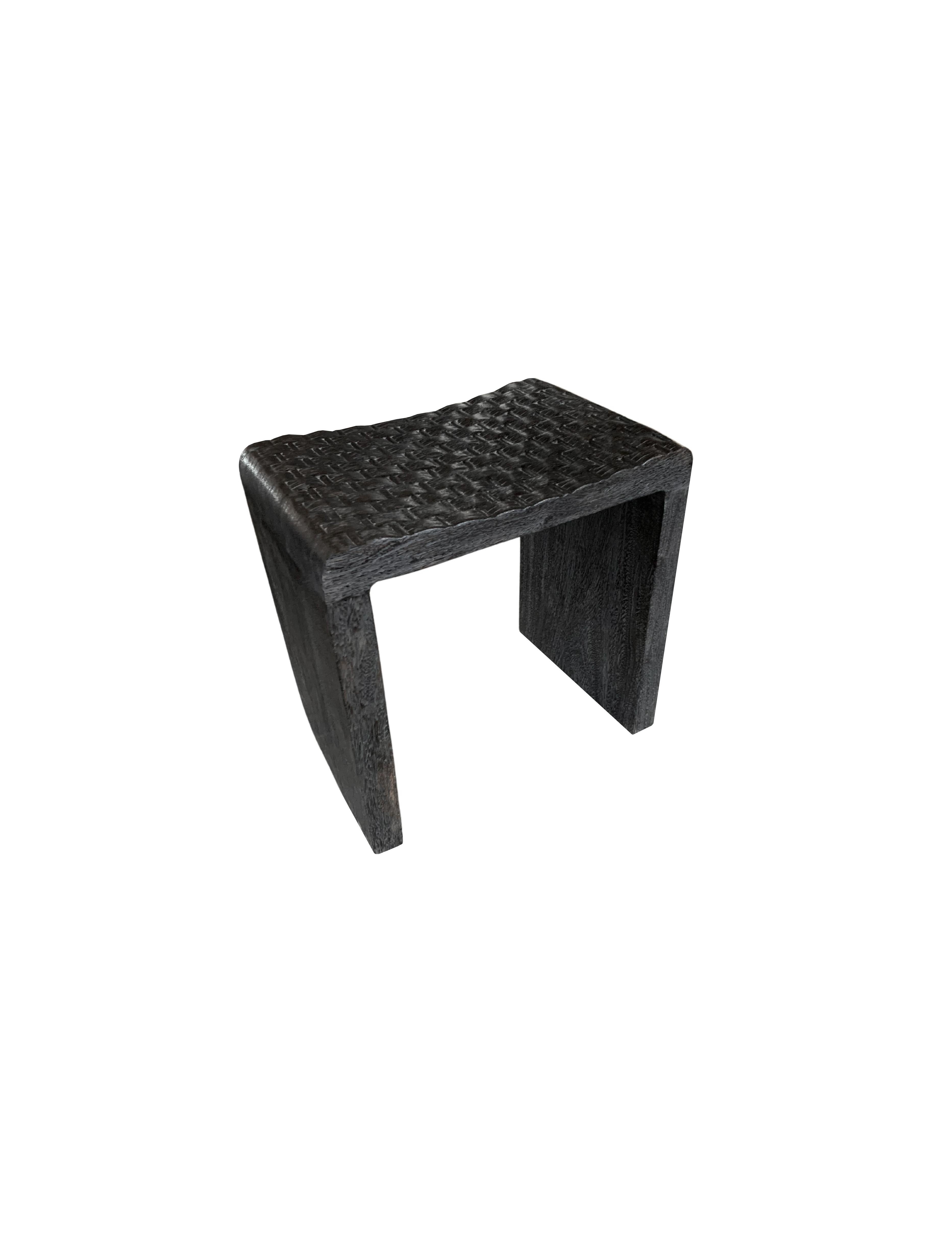 Indonesian Sculptural Mango Wood Stool with Carved Detailing & Burnt Finish Modern Organic For Sale