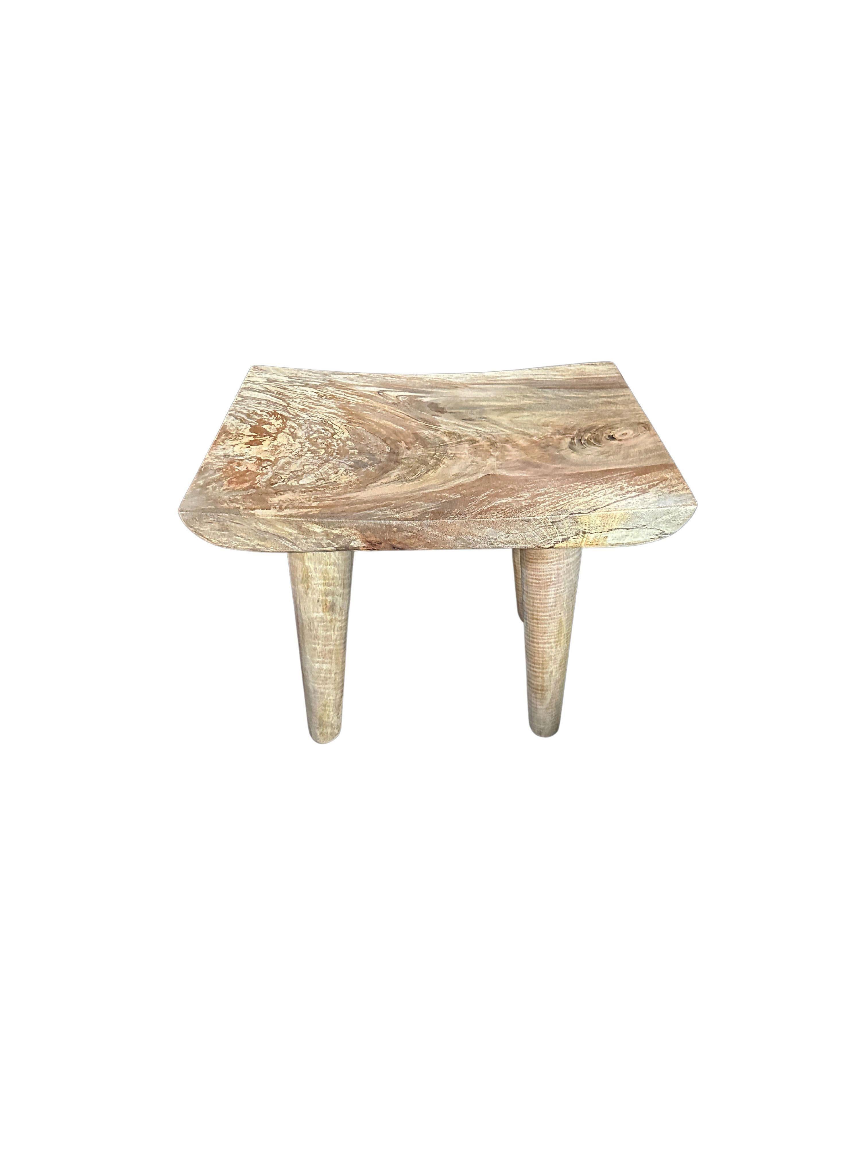 Hand-Crafted Sculptural Mango Wood Stool with Curved Seat, Natural Finish For Sale