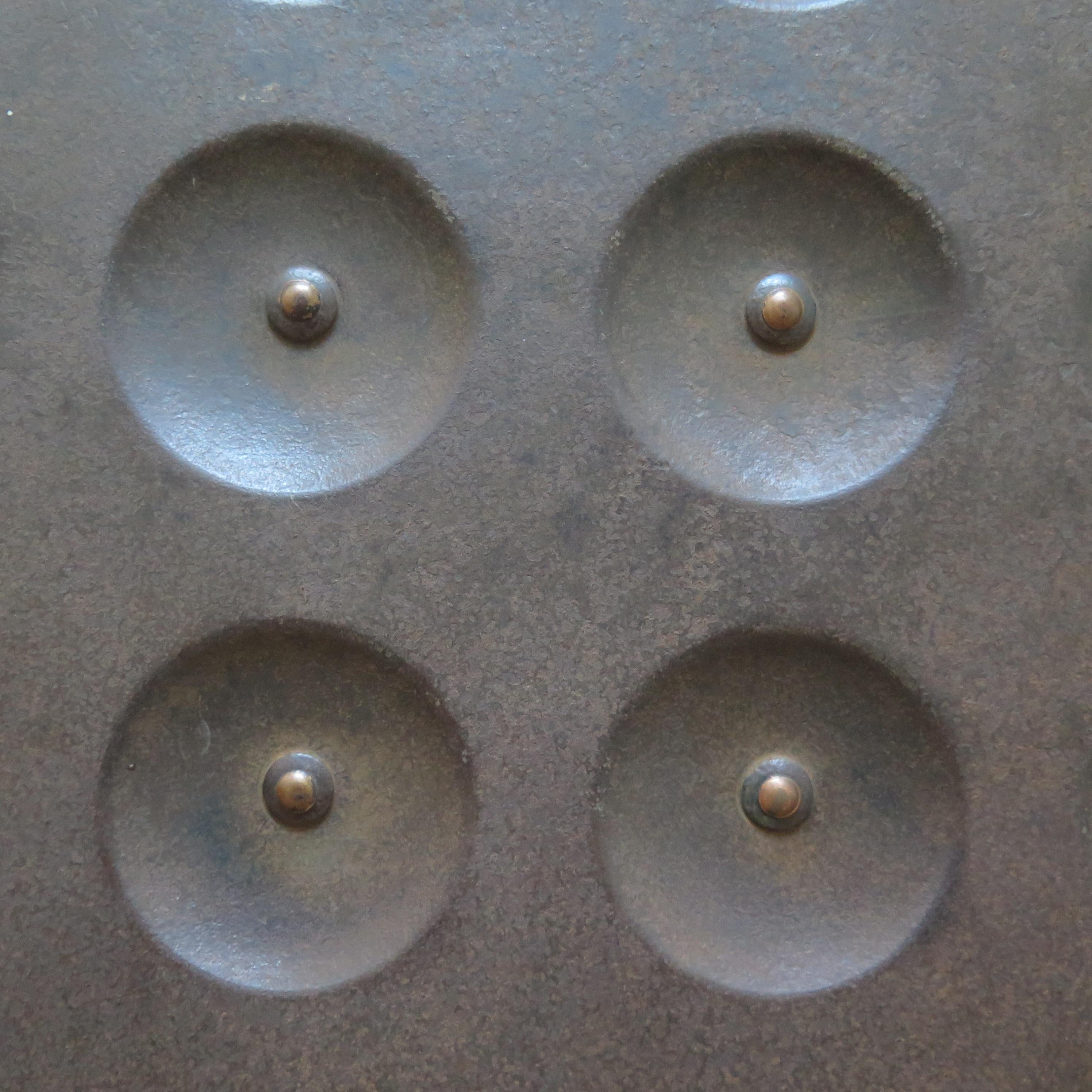 A most unusual sheet metal heating radiator that came from an elegant Victorian house in Maine. It is now mounted on a metal base as a work of art which it is. It could also be made to hang on a wall as art or be hooked up to a heating system. The
