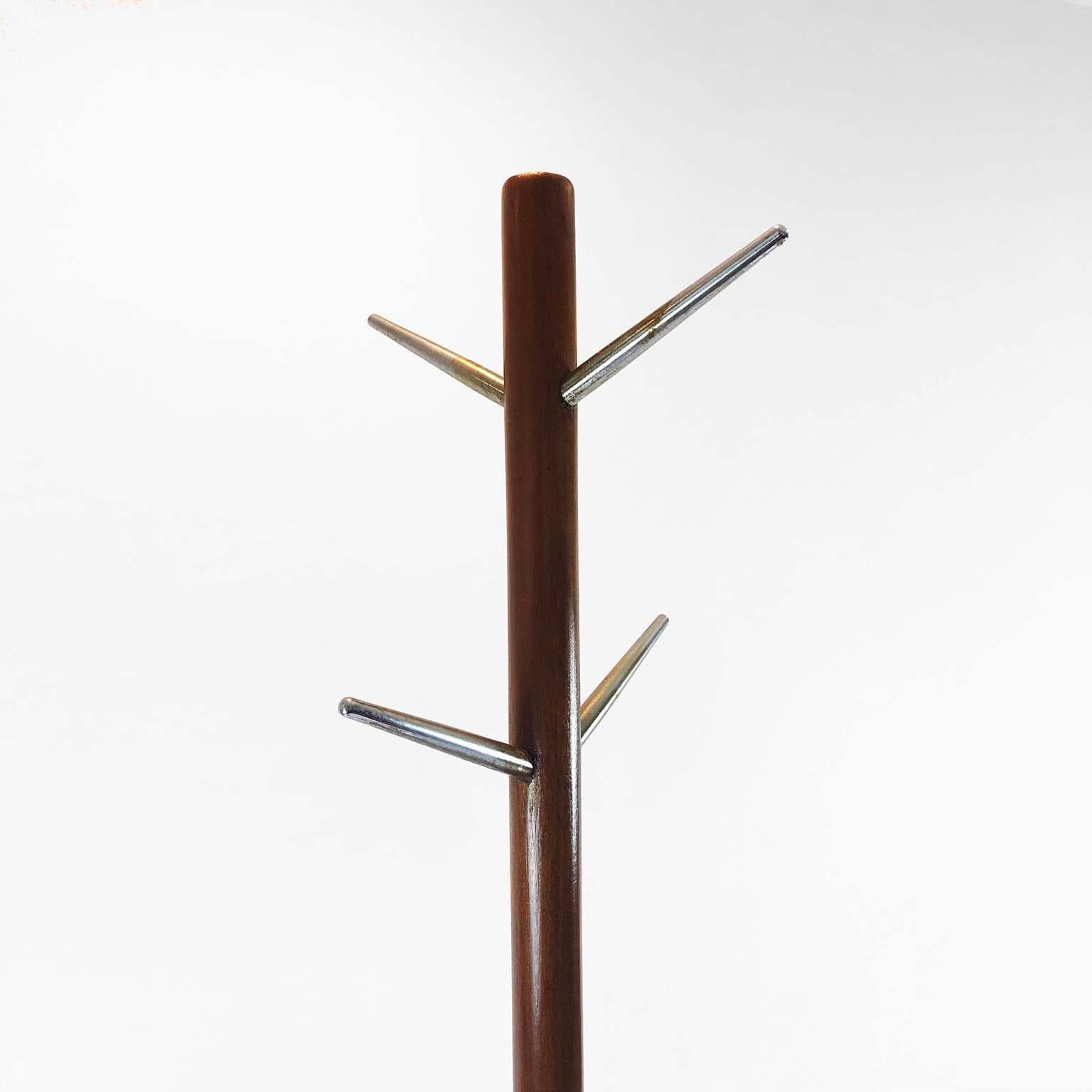 Designed by IRGSA (Industrias Ruíz Galindo), circa 1960. We offer this wonderful Mid-Century Modern coat rack. The coatrack is sculptural enough it can be put in nearly any environment and still hold it's own.