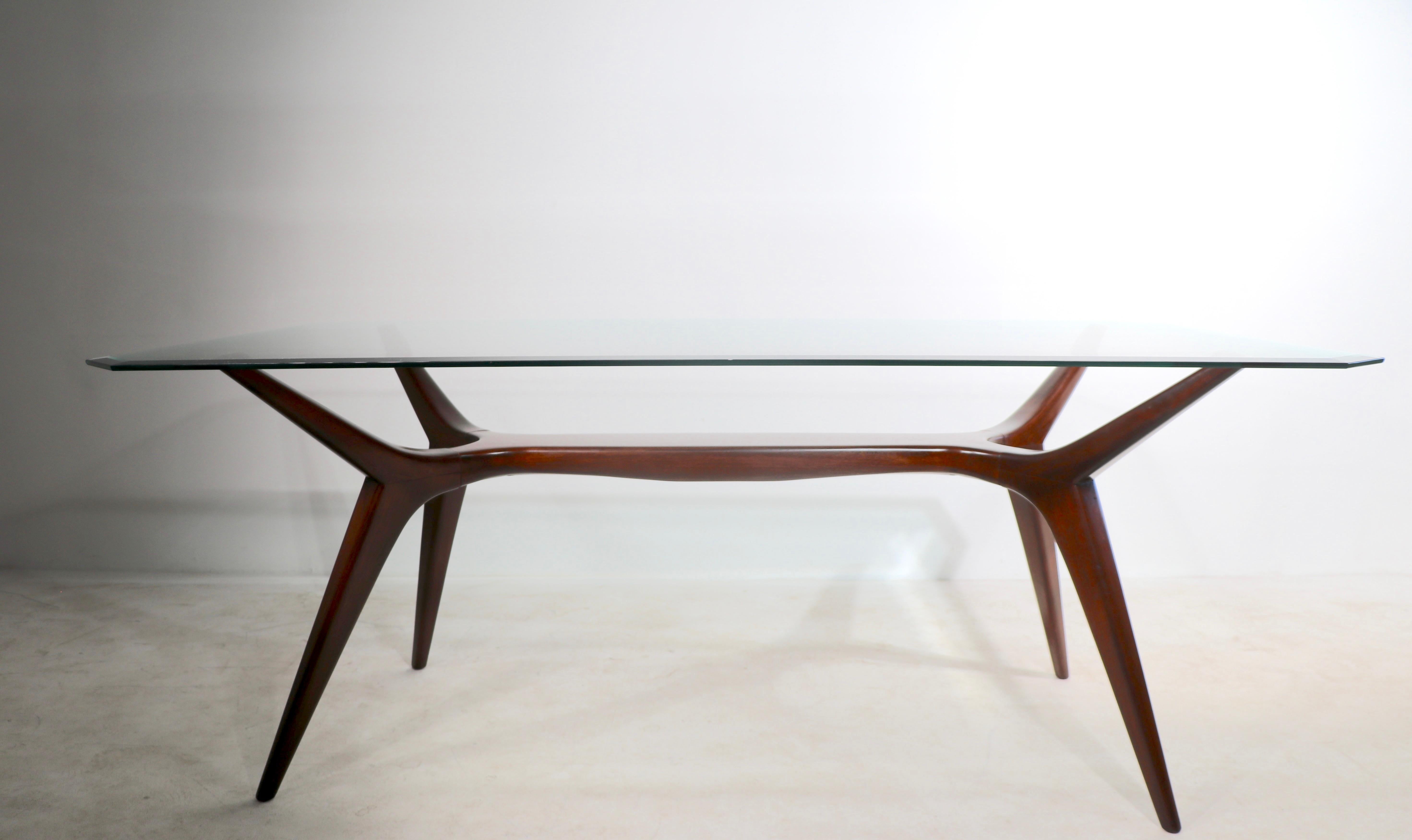 Mid-Century Modern Sculptural Mid Century Dining Table of Cuban Mahogany and Plate Glass Ca. 1950's For Sale