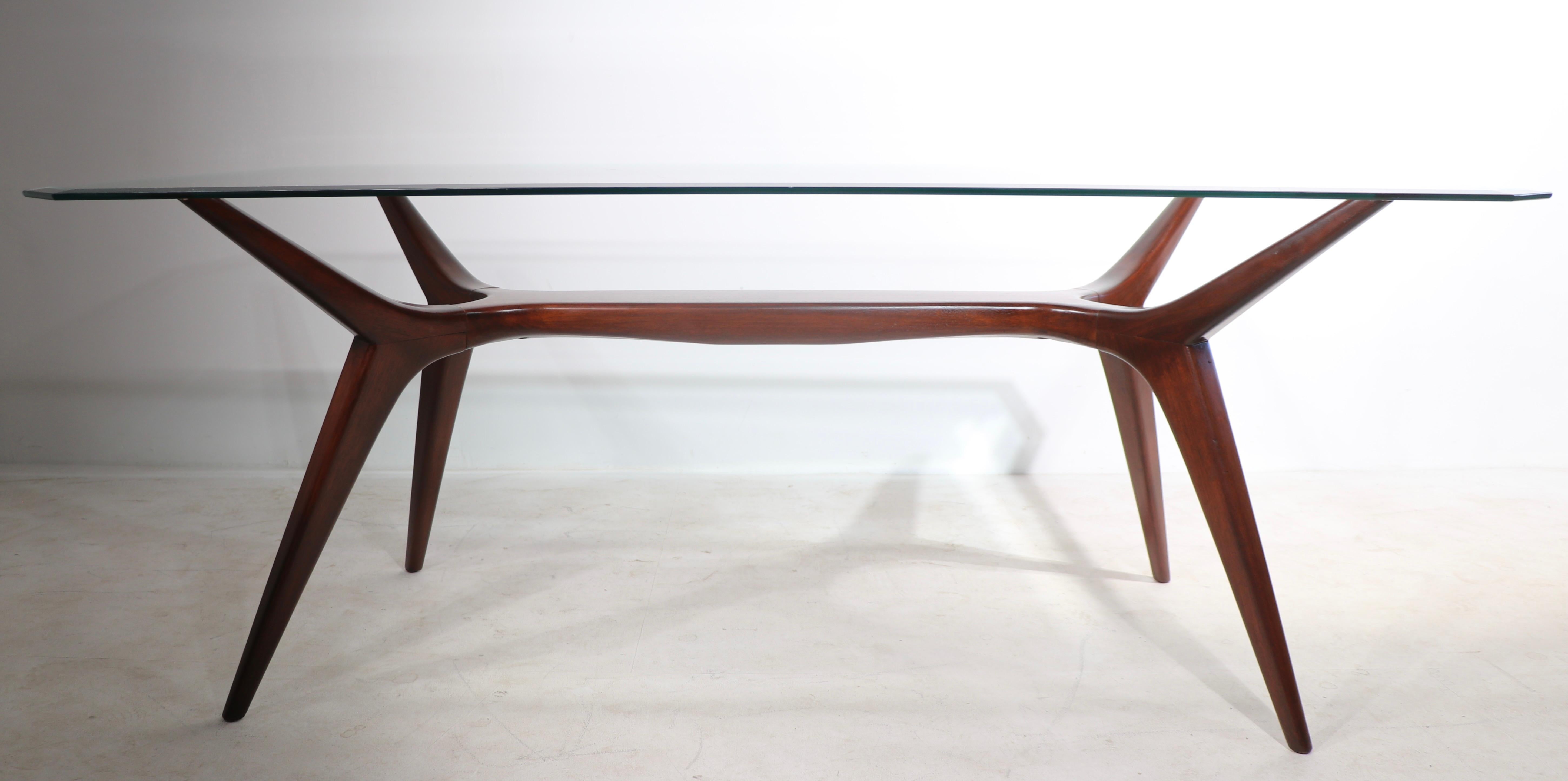 Brazilian Sculptural Mid Century Dining Table of Cuban Mahogany and Plate Glass Ca. 1950's For Sale