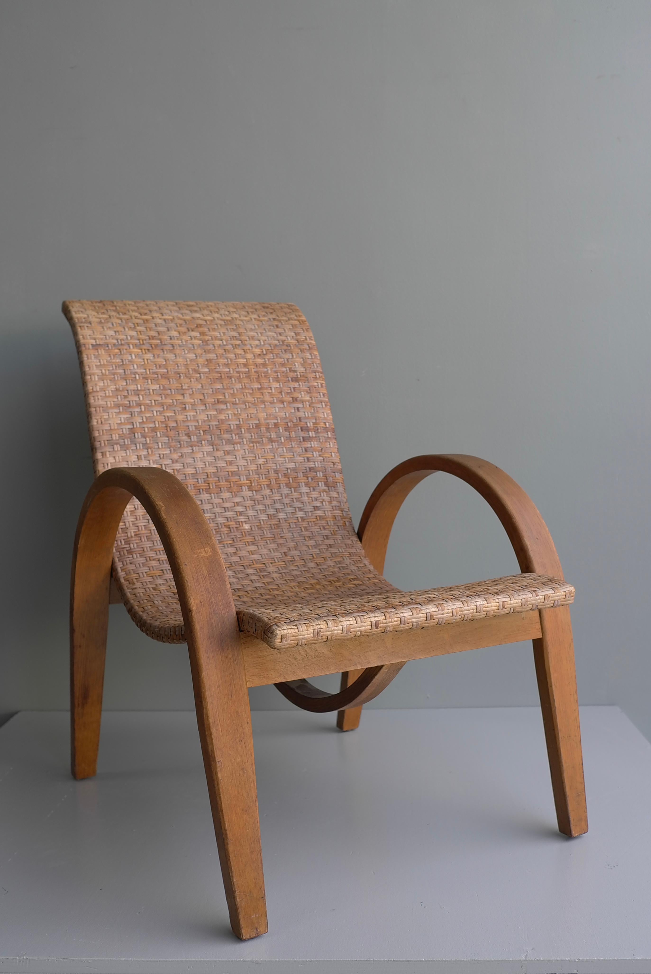 Sculptural Mid-Century Modern Armchair in Wood and Cane, 1950's In Good Condition For Sale In Den Haag, NL