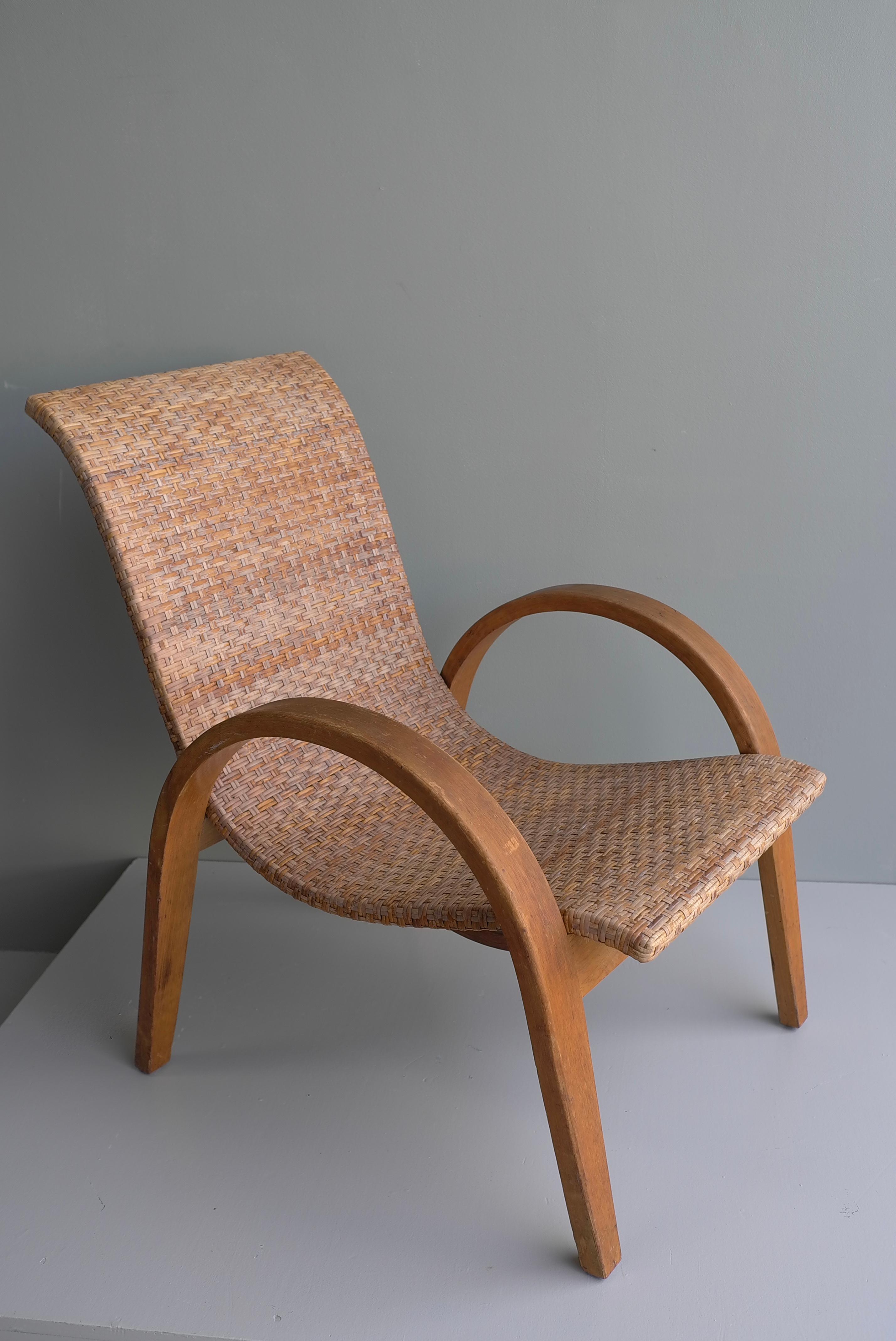 20th Century Sculptural Mid-Century Modern Armchair in Wood and Cane, 1950's For Sale