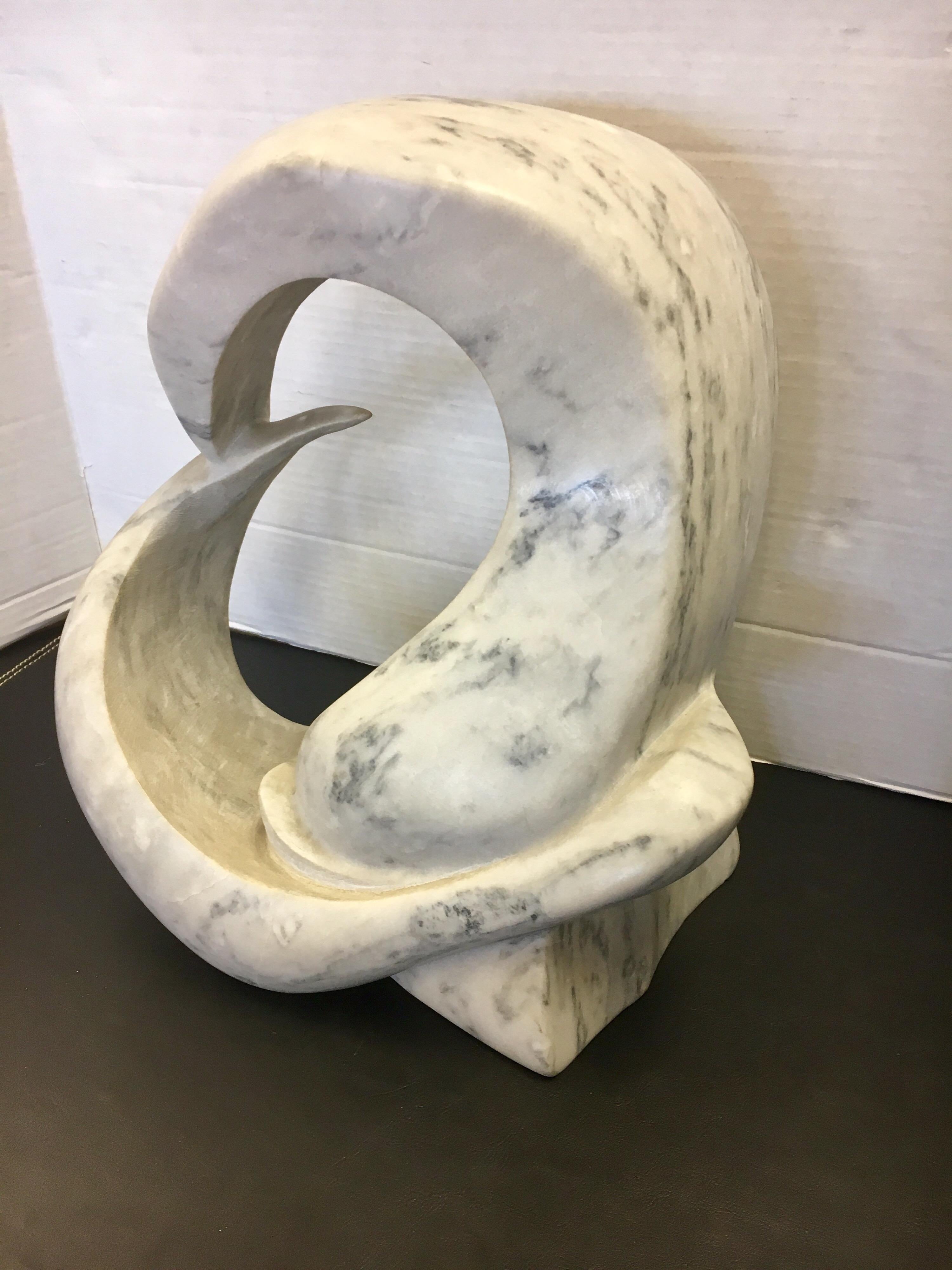 A true work of art is this almost fifty pound Carrara marble abstract sculpture from the 1970s.
Condition is very good with no flaws. We do not see any hallmarks.