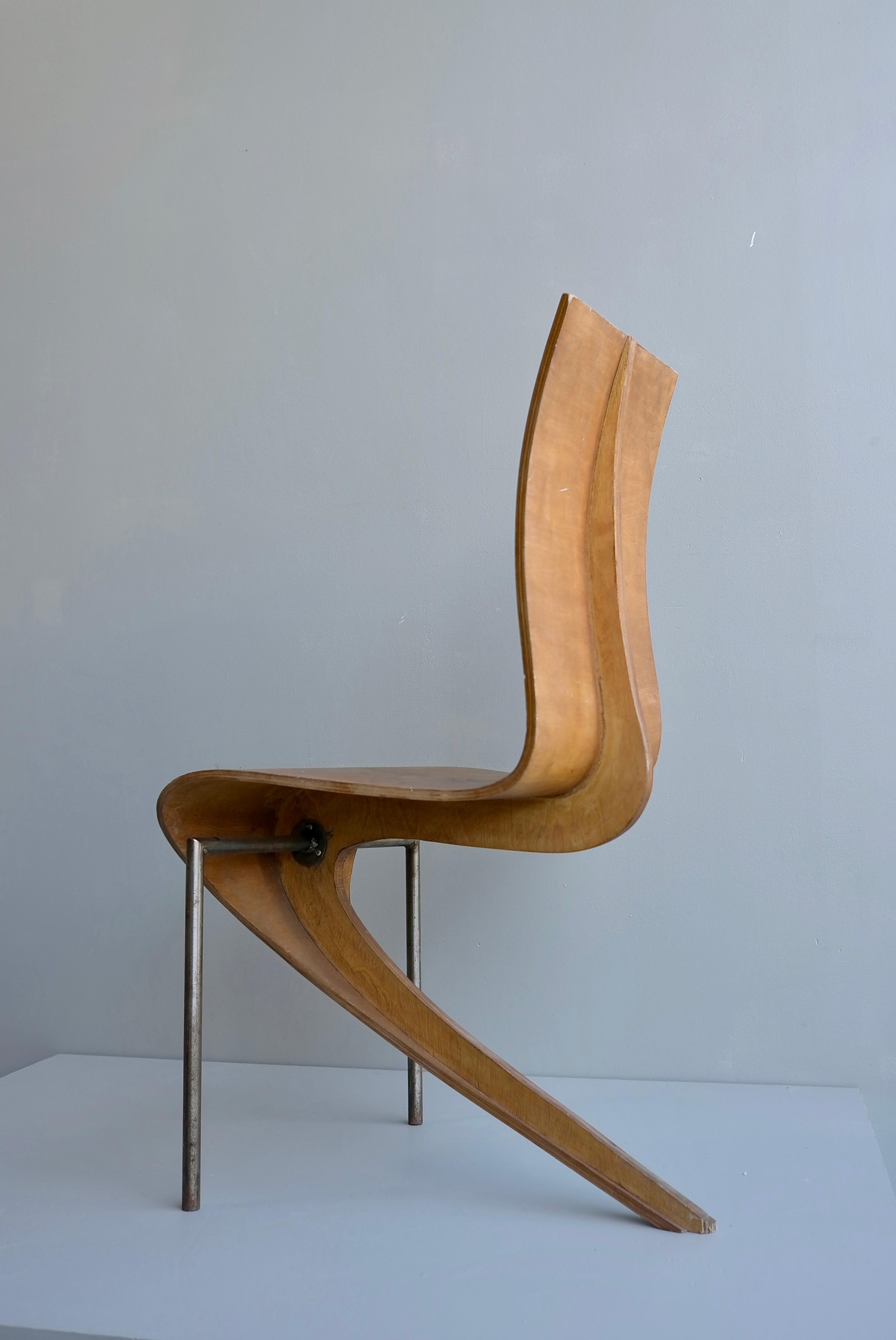 Sculptural Mid-Century Modern French side chair, in style of André Bloc.