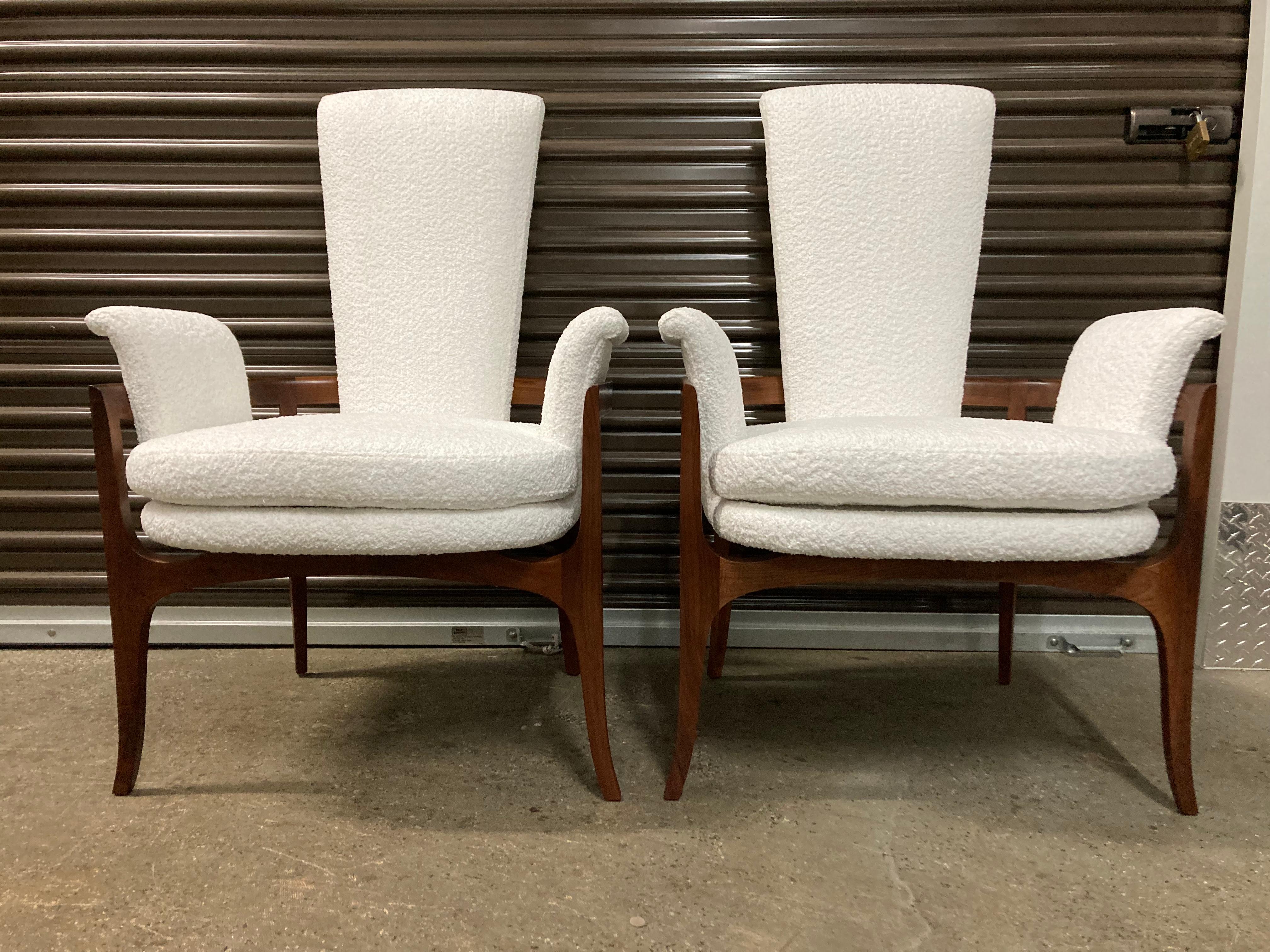 Sculptural Mid-Century Modern Lounge Chairs. 
Chairs have solid walnut legs, seats are recovered in white boucle fabric. Ready for a new home.