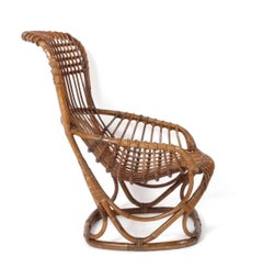 Sculptural Mid Century Rattan Lounge Chair in the style of Franco Albini