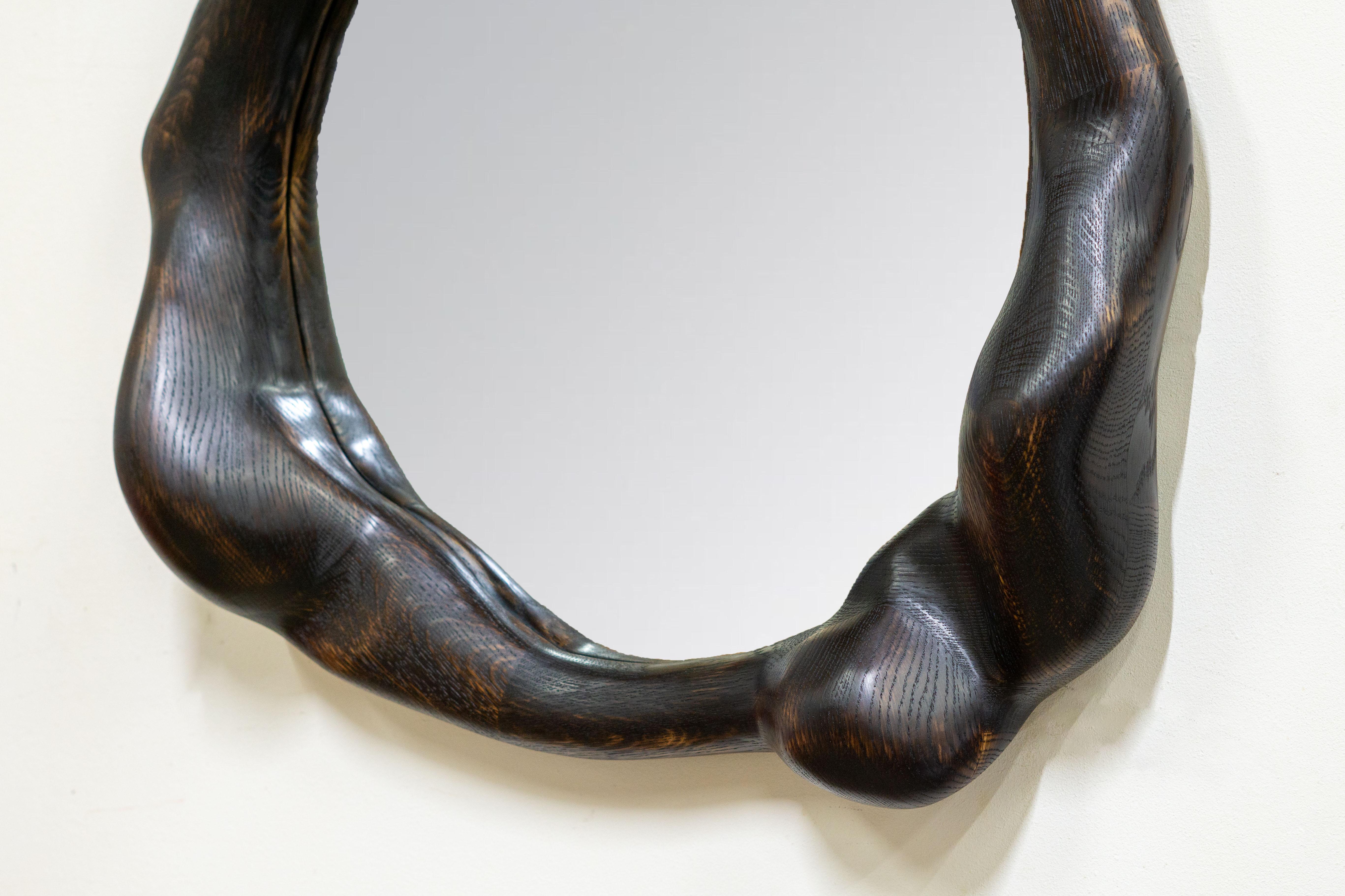 German Sculptural Mirror in Charred Oak For Sale
