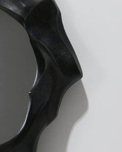 Sculptural mirror in stoneware