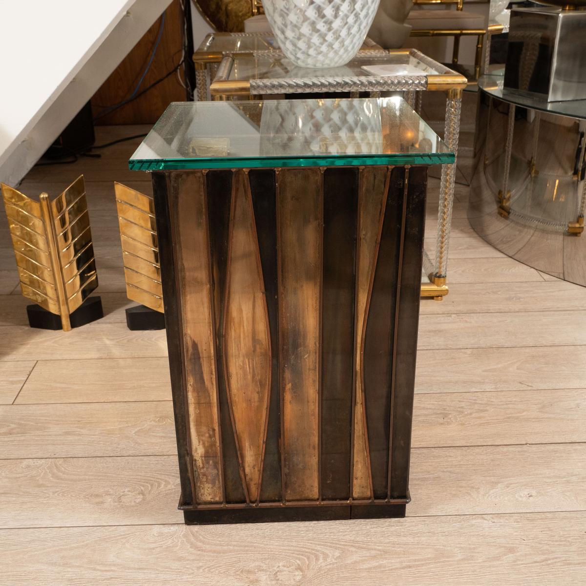 Sculptural brass and patinated metal side table by Curtis Jere. Signed.