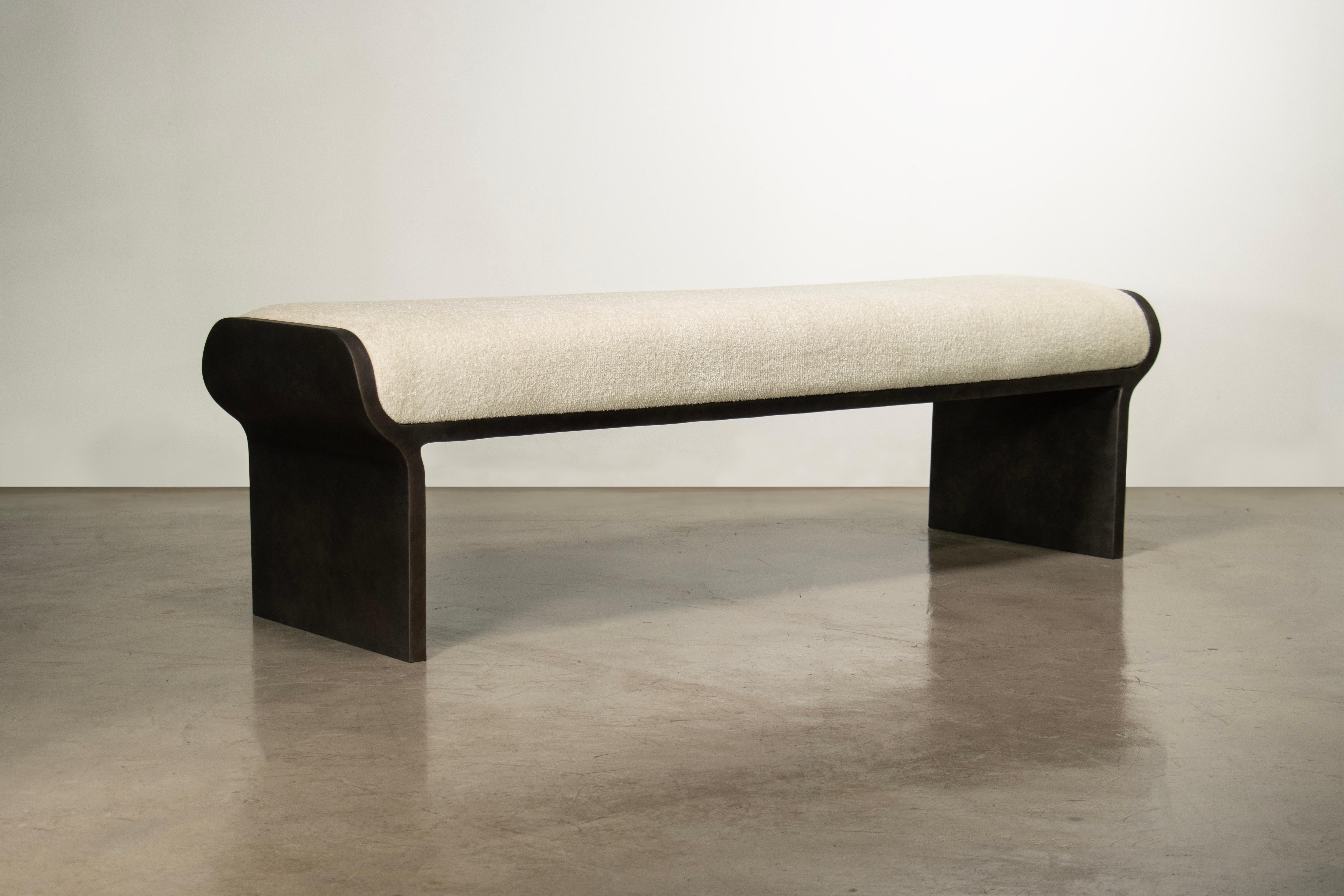 The Elia Bench by Costantini features a metal frame and upholstered seat.  Available as shown or in custom sizes and shapes and the fabric or leather of your choice. Additionally, the bench can be made in steel, iron, or lacquered or powder coated