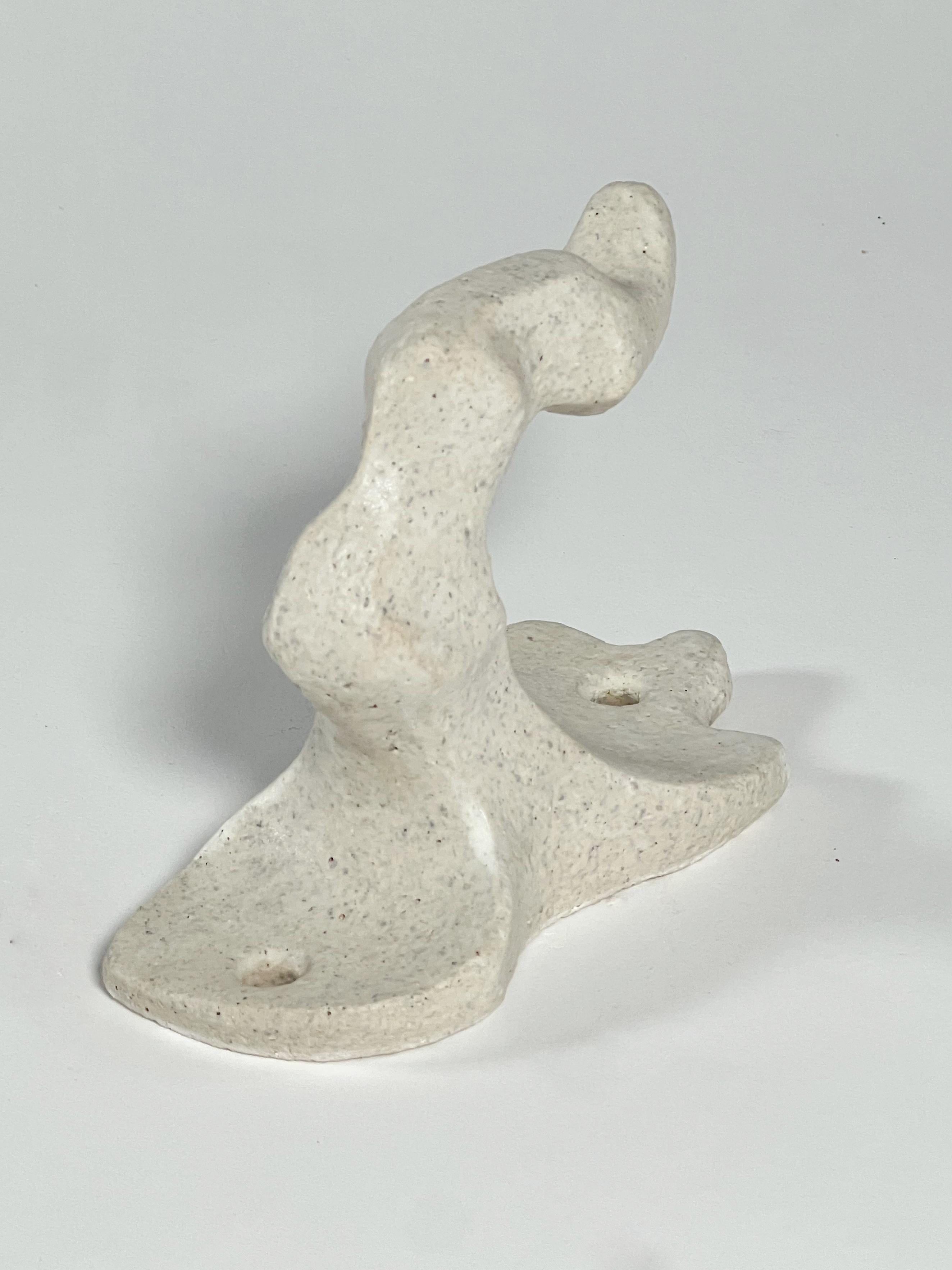 This handcrafted scuplutrual hook by Doris Josovitz, from Lost Quarry, is a beautiful expression of timeless artistry, designed to bring warmth and elegance to your space. Sculpted with intention, its textured white clay finish feels as natural as
